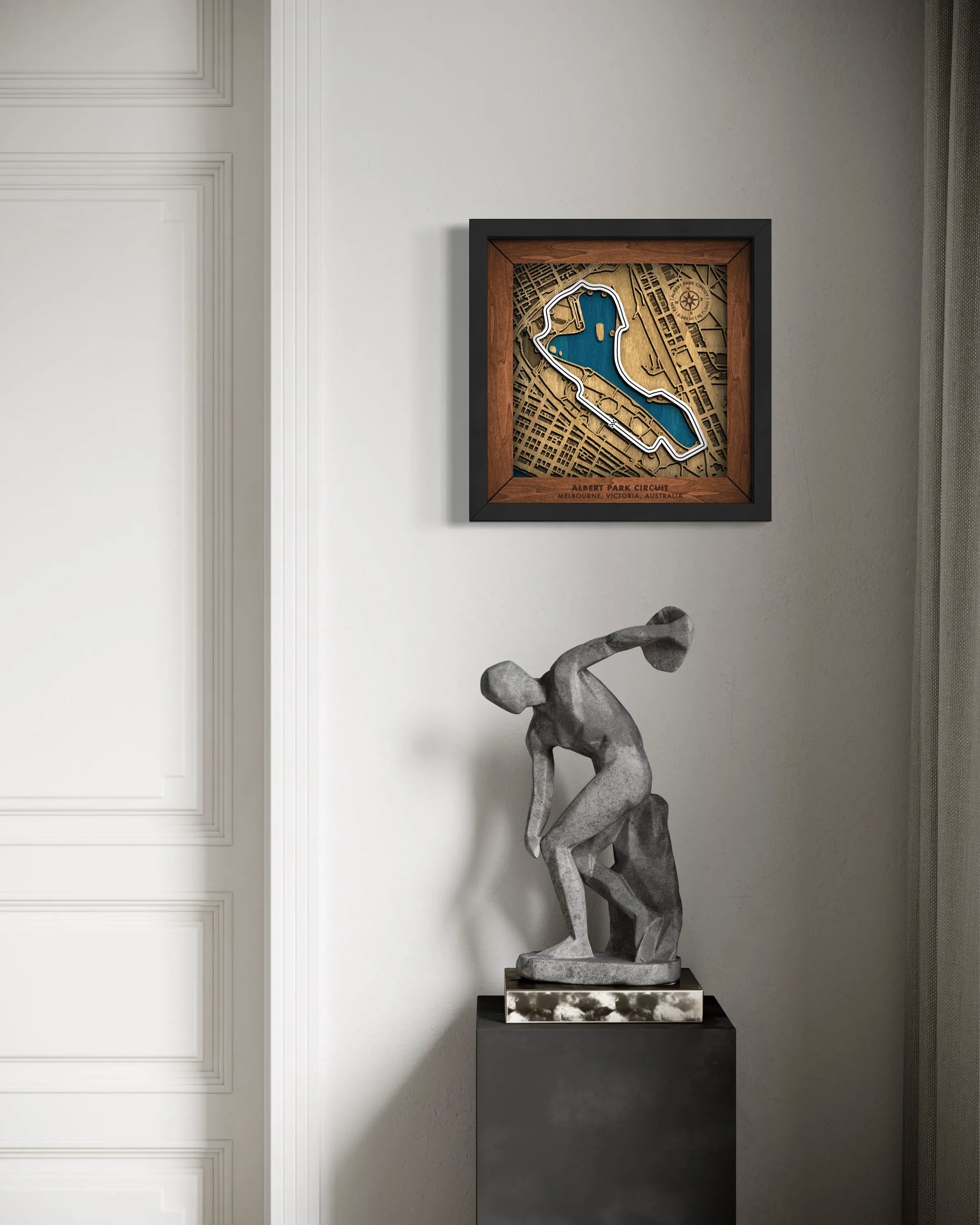 Handcrafted Albert Park Circuit layered wooden racetrack wall art displayed in a modern living room.