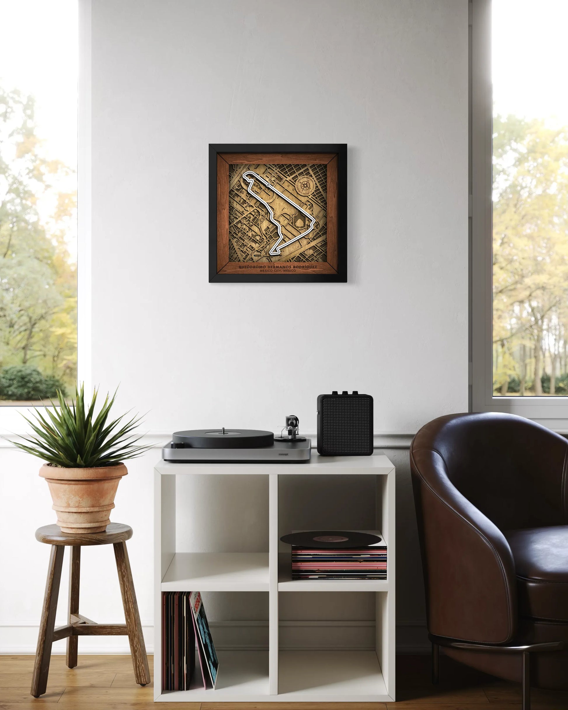 Handcrafted Aut—dromo Hermanos Rodr’guez layered wooden racetrack wall art displayed in a modern living room.