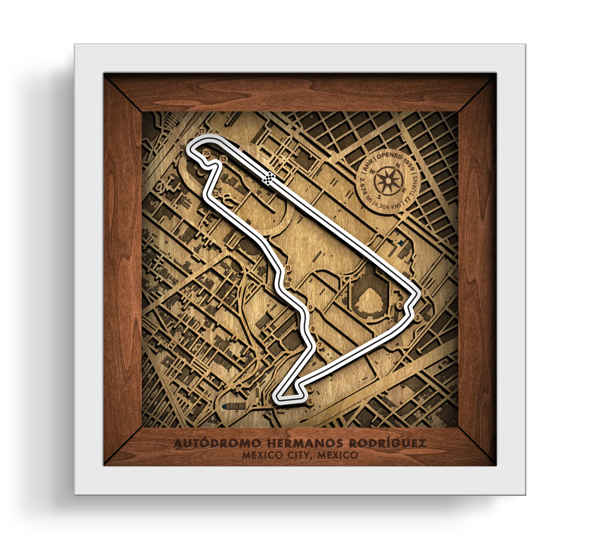 Handcrafted Aut—dromo Hermanos Rodr’guez layered wooden racetrack wall art in a white frame.