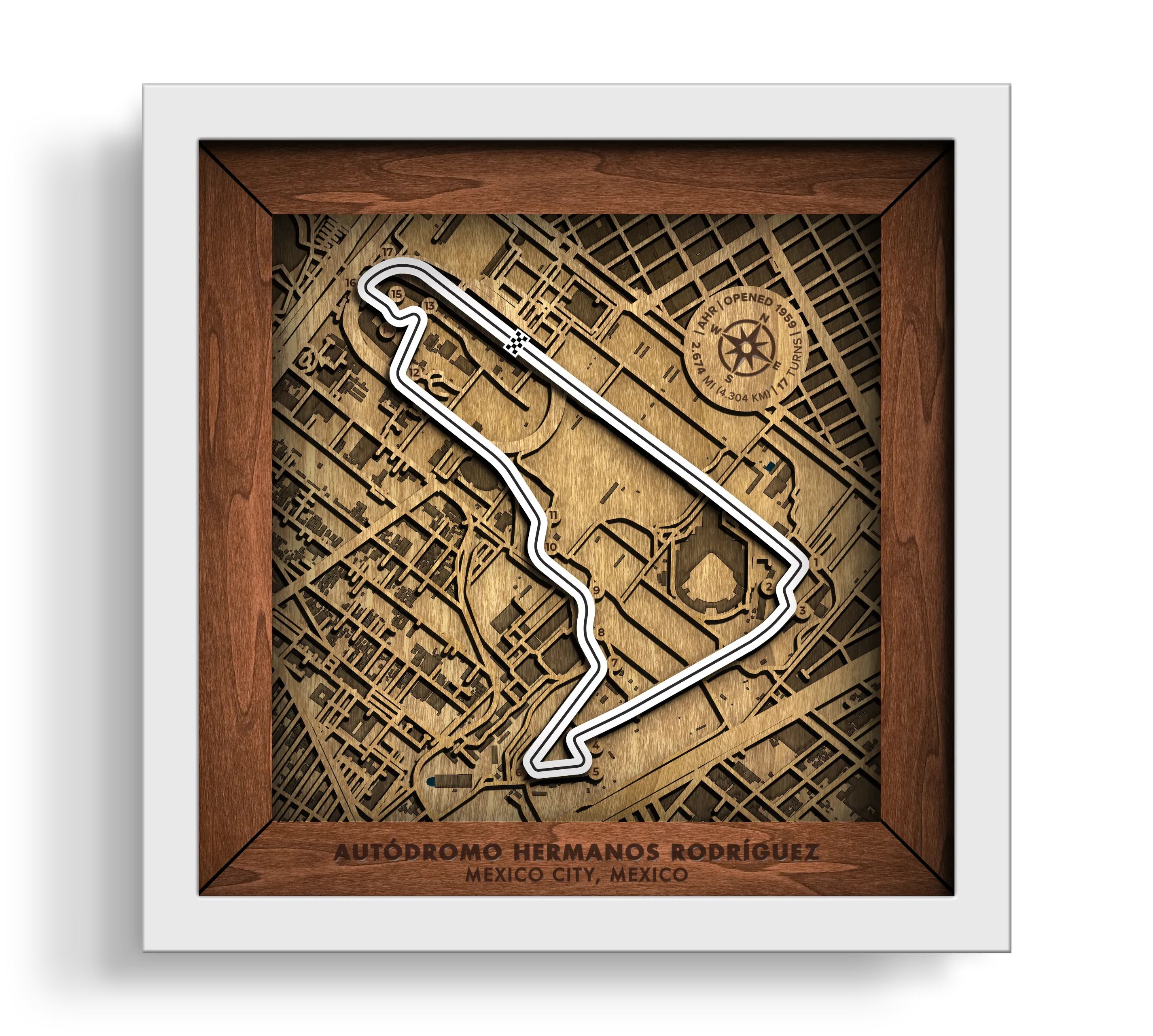 Handcrafted Aut—dromo Hermanos Rodr’guez layered wooden racetrack wall art in a white frame.