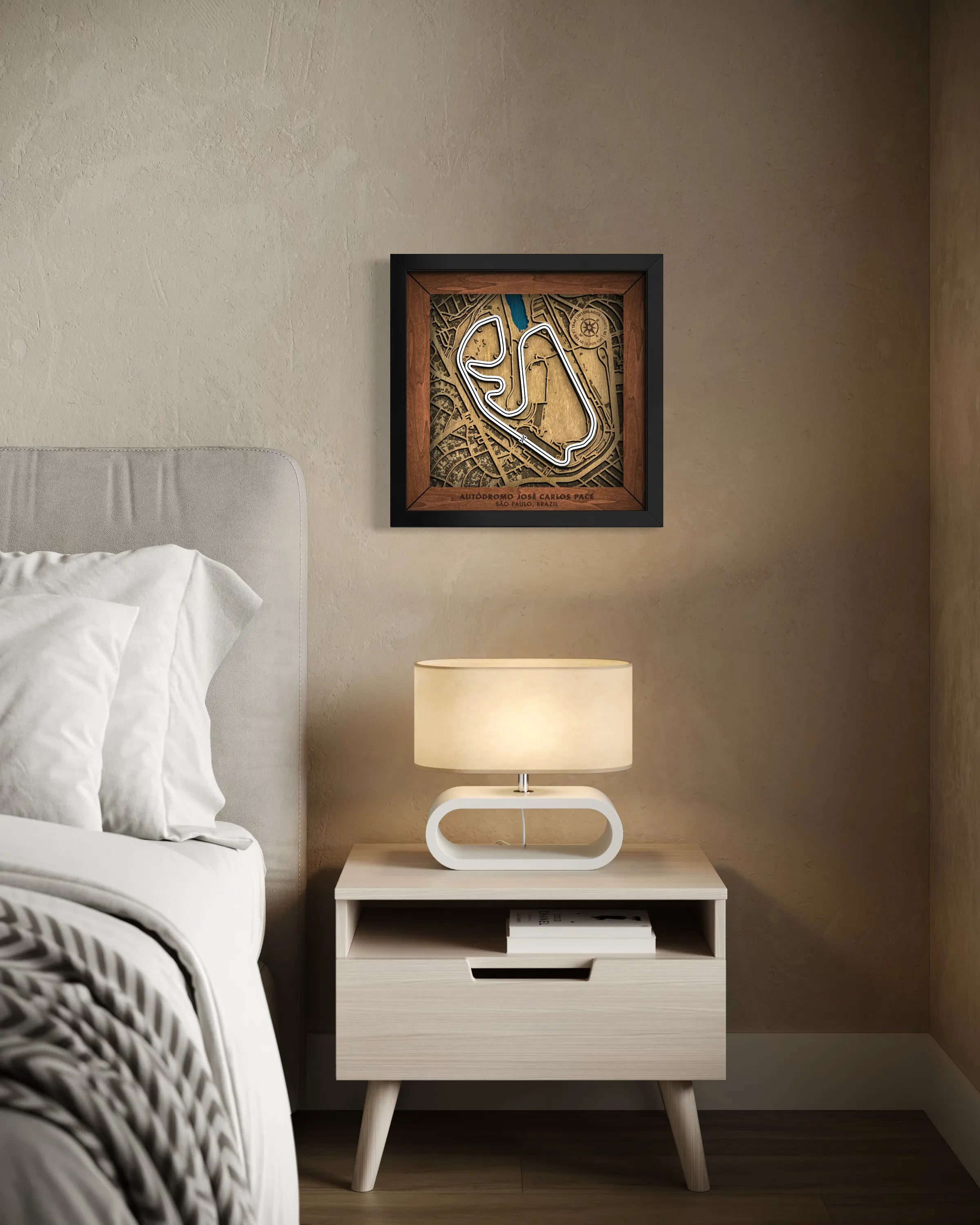 Handcrafted Aut—dromo JosŽ Carlos Pace layered wooden racetrack wall art displayed in a modern living room.