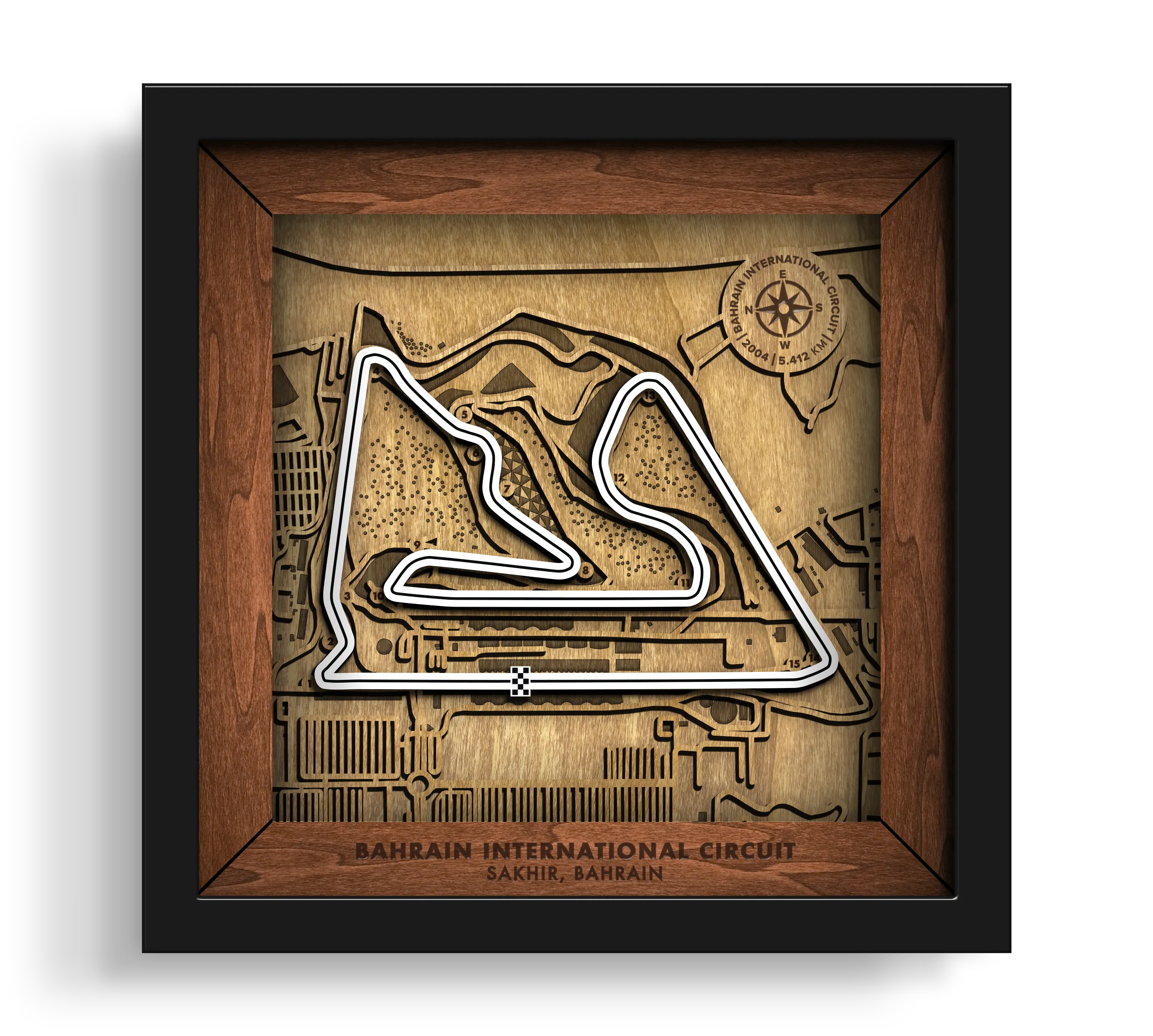 Handcrafted Bahrain International Circuit layered wooden racetrack wall art in a black frame.