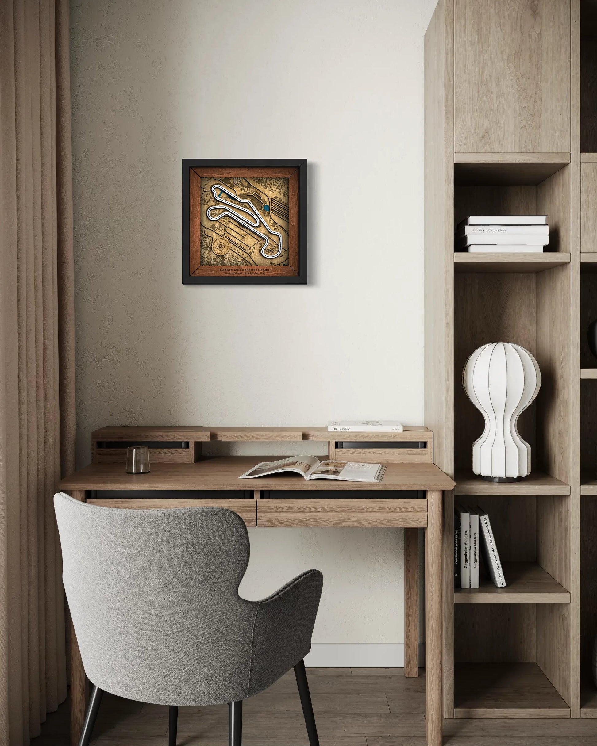 Handcrafted Barber Motorsports Park layered wooden racetrack wall art displayed in a modern living room.