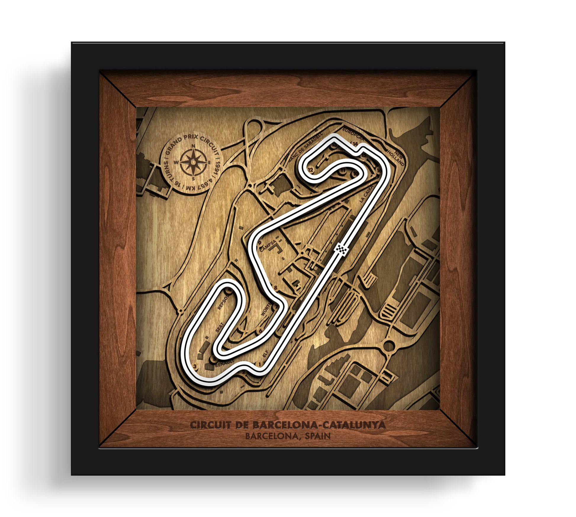Handcrafted Circuit de Barcelona-Catalunya layered wooden racetrack wall art in a black frame.