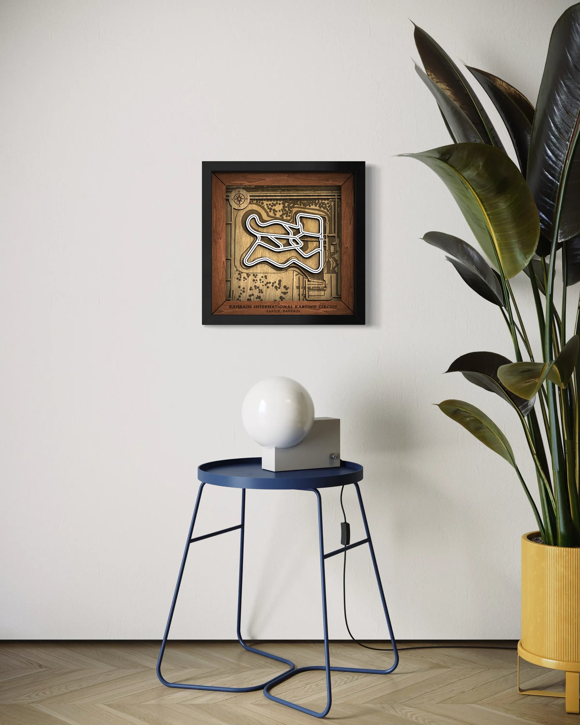Handcrafted Custom Circuits of the Bahrain International Karting Circuit layered wooden wall art in a black frame.