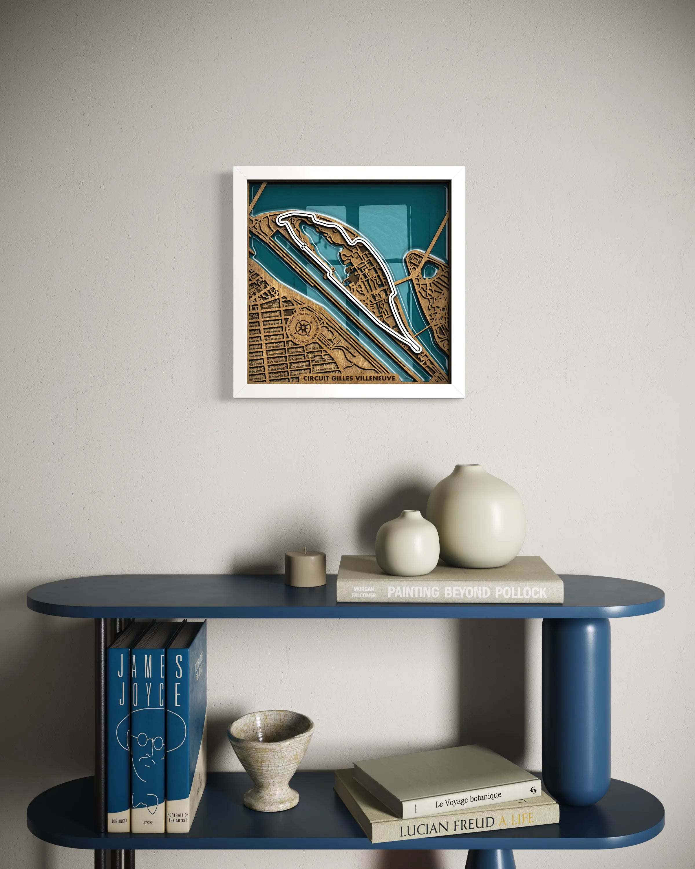 Handcrafted Circuit Gilles Villeneuve layered wooden racetrack wall art with epoxy resin waters displayed in a modern living room with a white frame.