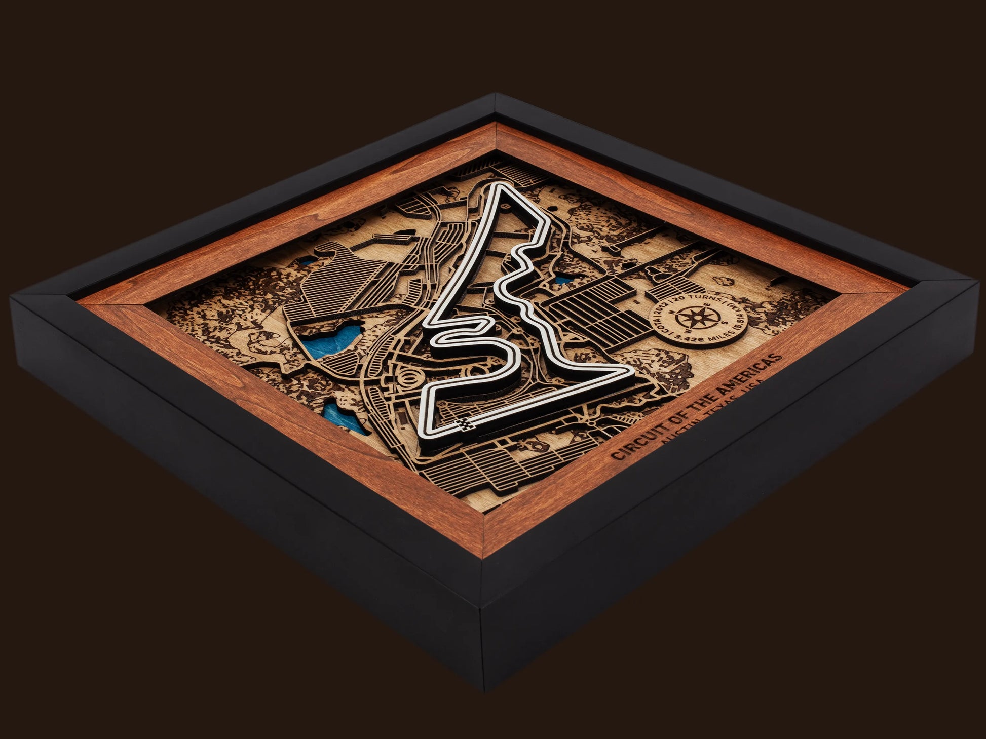 Close-up of the handcrafted layered wood construction and fine details of the Circuit of The Americas¨ wall art.