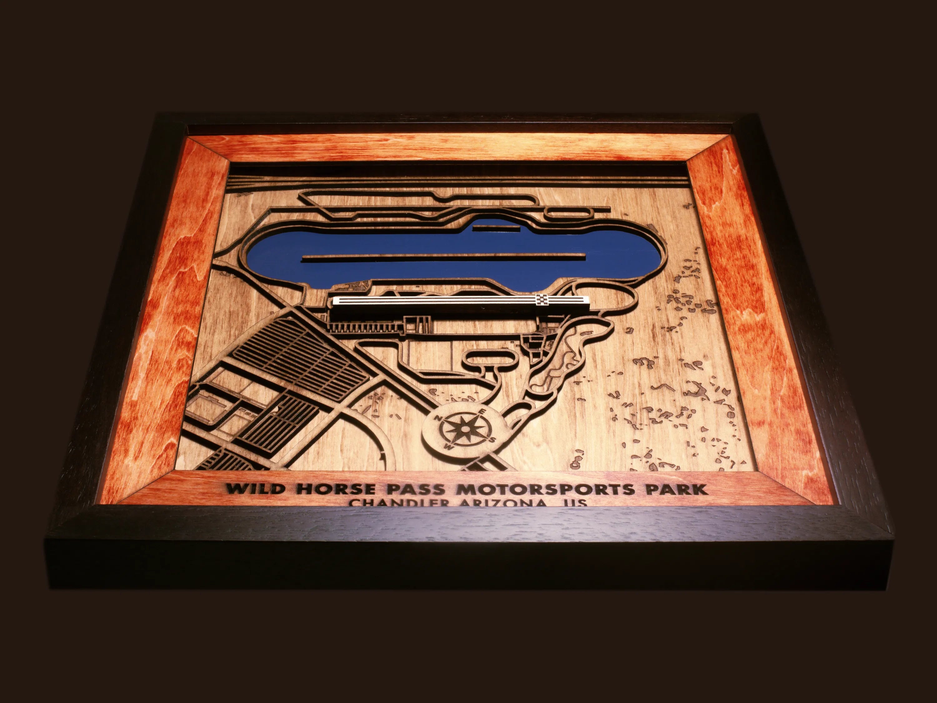 Handcrafted F1 Racing Circuits wooden wall art displayed in a modern living room.