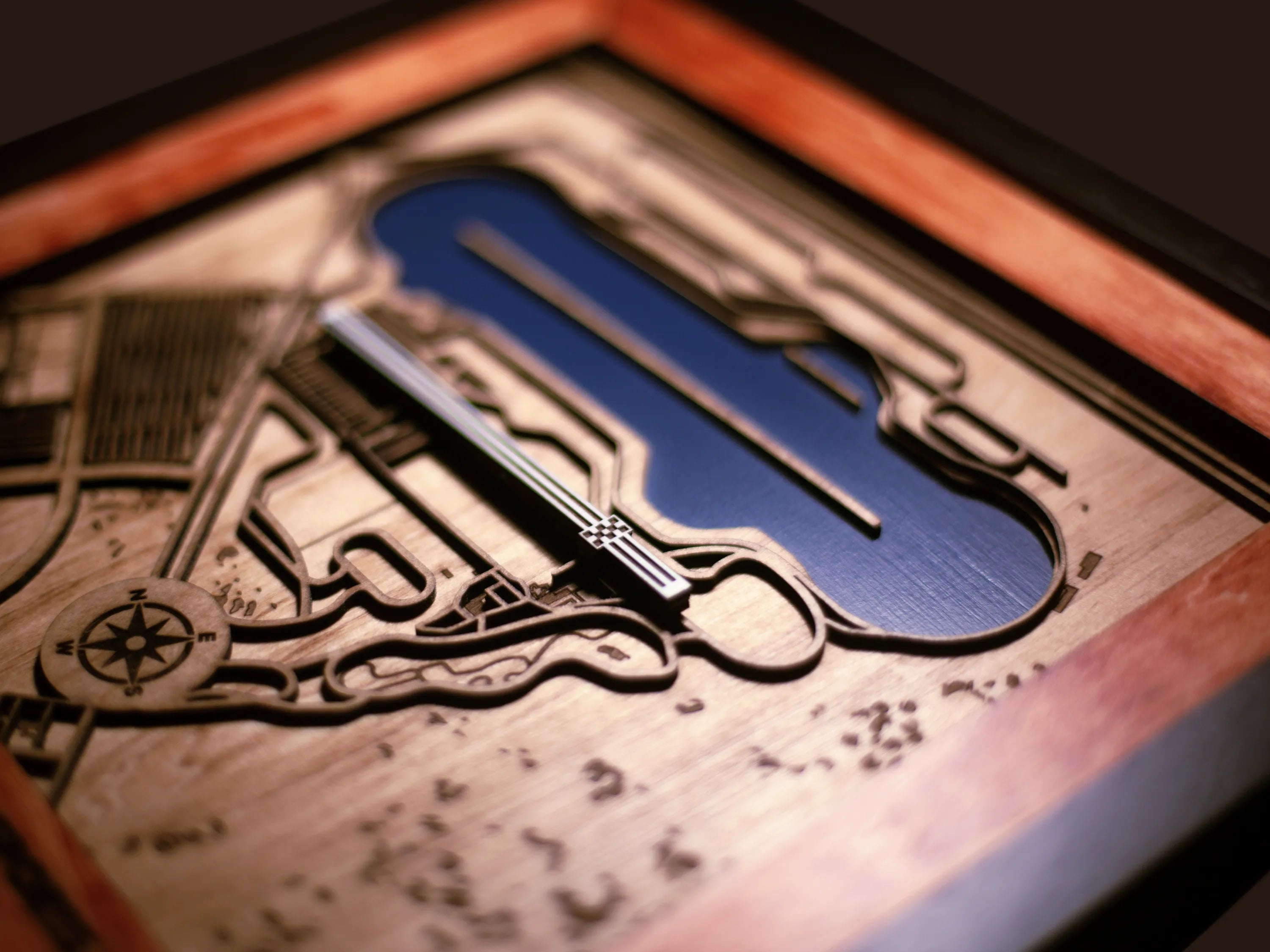 Handcrafted F1 Racing Circuits wooden wall art displayed in a modern living room.