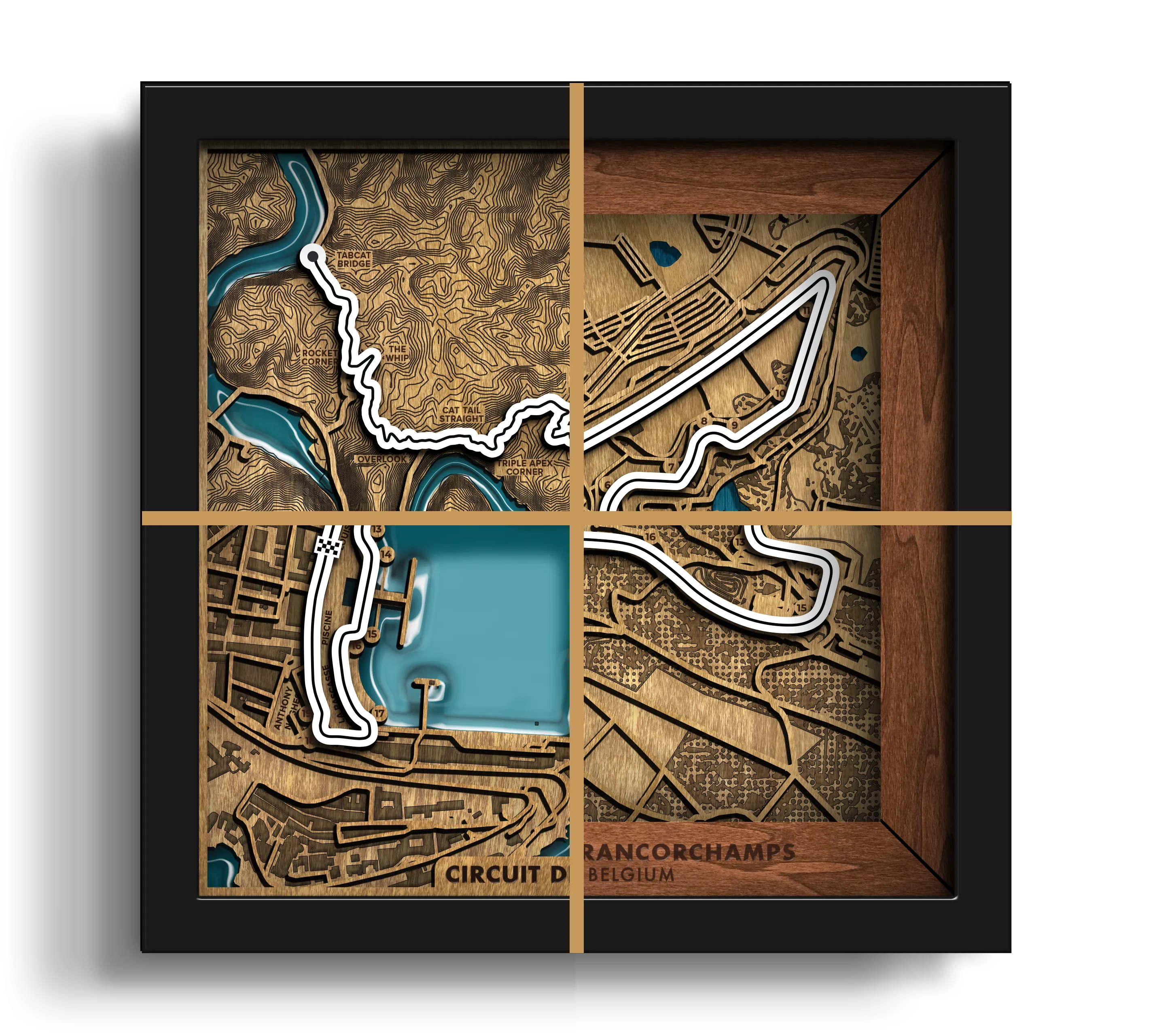 A framed 3D topographical map wall art of the Circuit de Spa-Francorchamps in Belgium, featuring a black frame, gold cross-section lines, and a blue water channel on a textured brown and gold background.