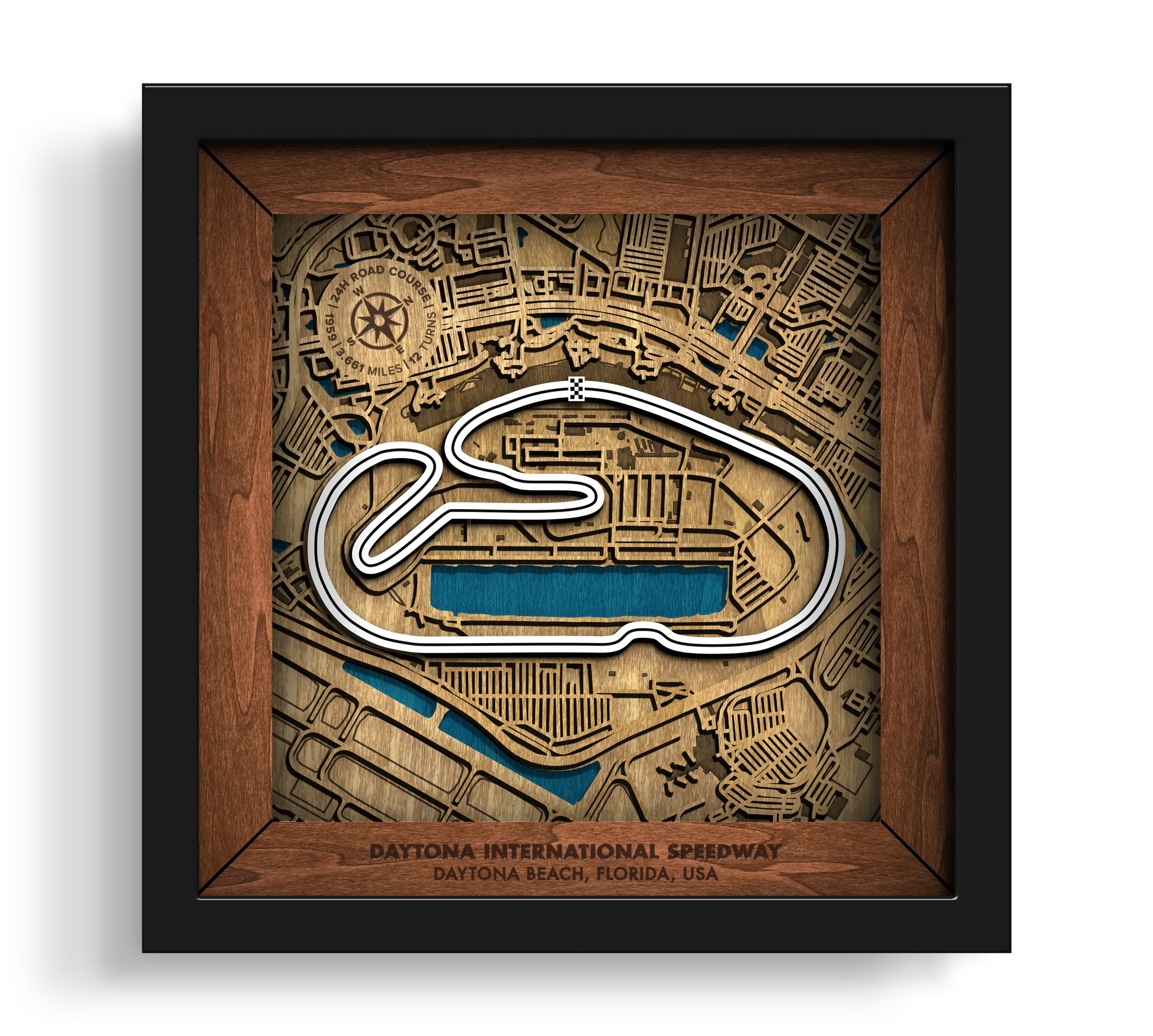 Handcrafted Daytona International Speedway layered wooden racetrack wall art in a black frame.