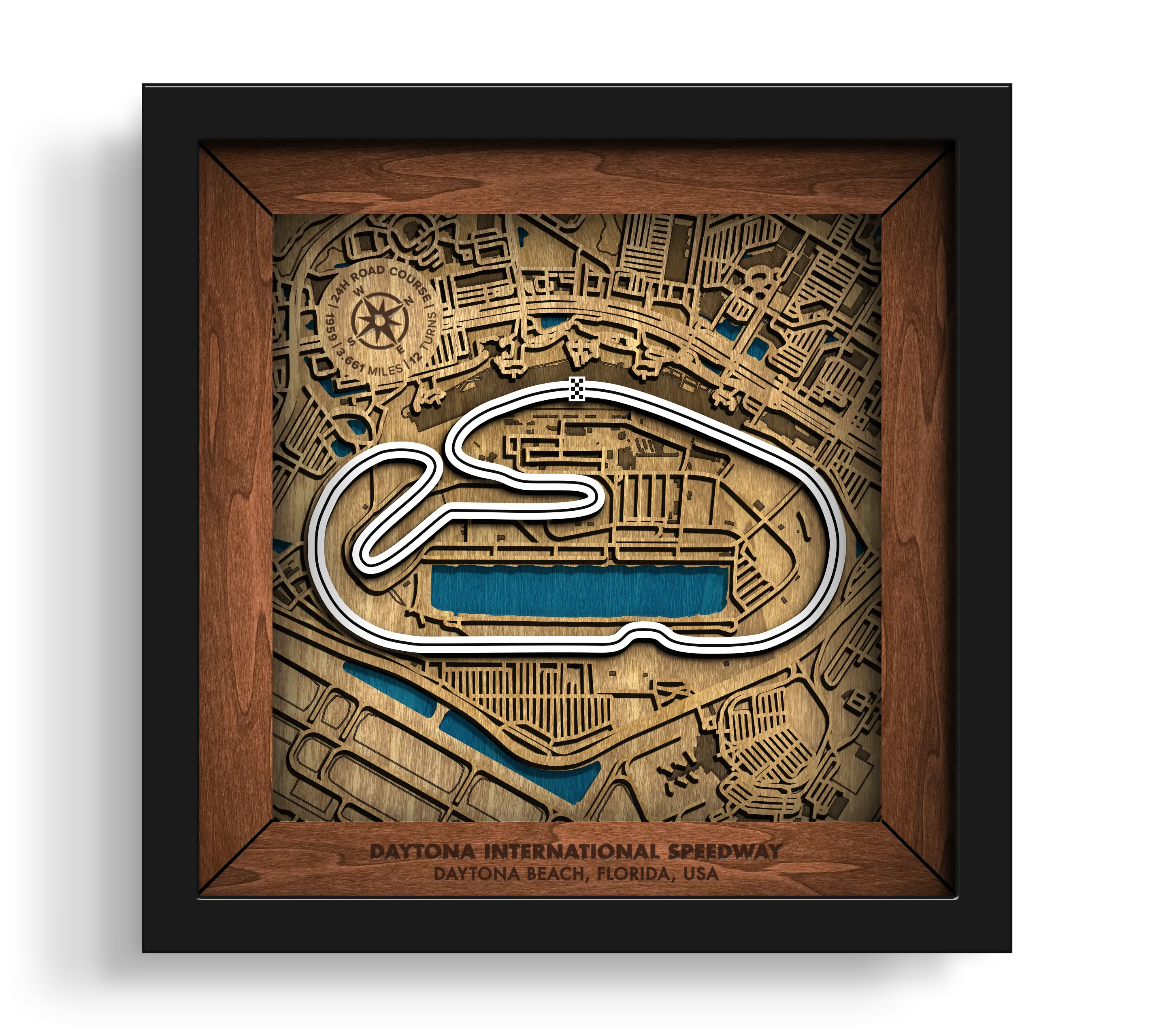 Handcrafted Daytona International Speedway layered wooden racetrack wall art in a black frame.