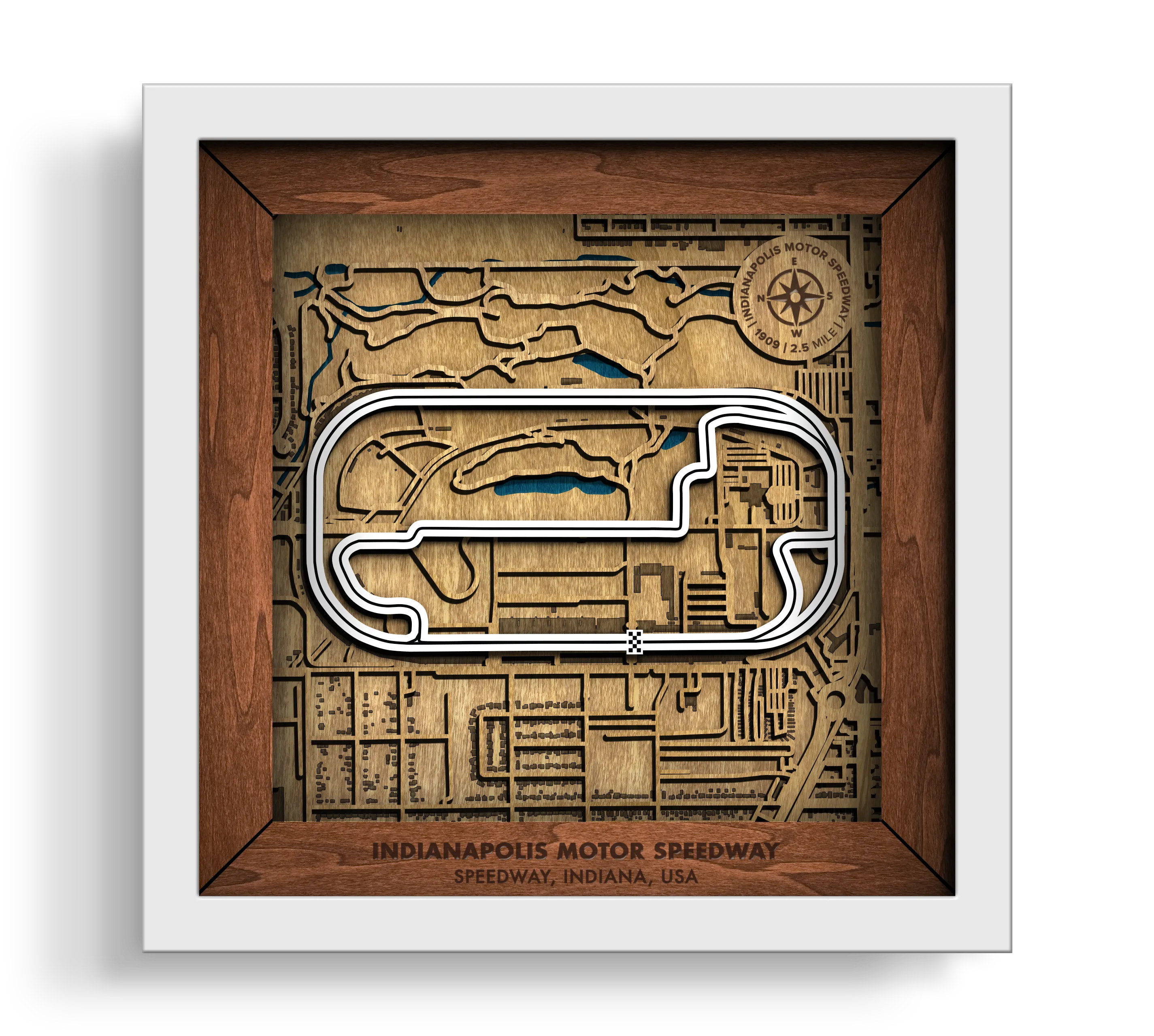Handcrafted Indianapolis Motor Speedway layered wooden racetrack wall art in a white frame.