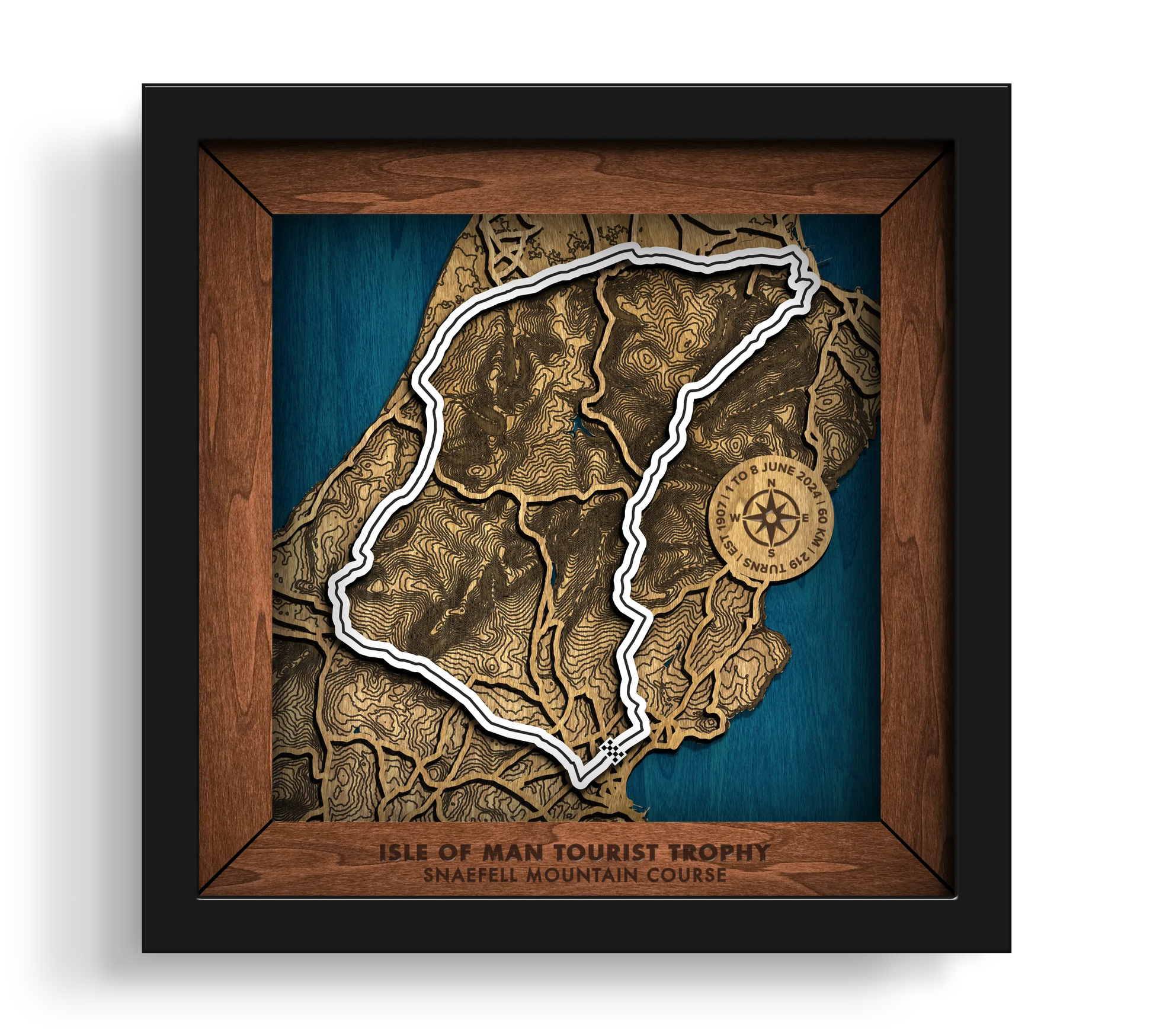Handcrafted Isle of Man TT Course layered wooden racetrack wall art in a black frame.