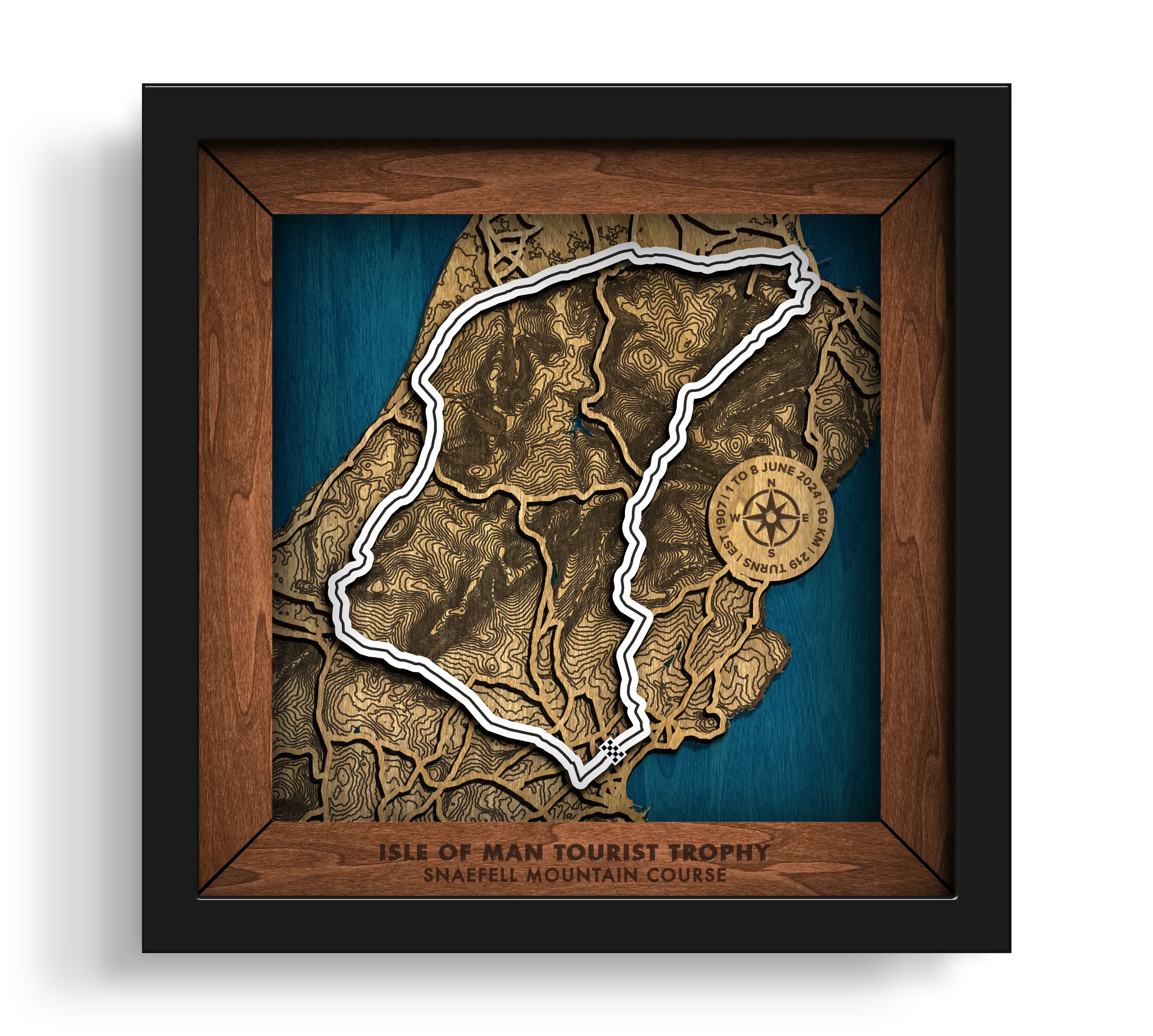 Handcrafted Isle of Man TT Course layered wooden racetrack wall art in a black frame.