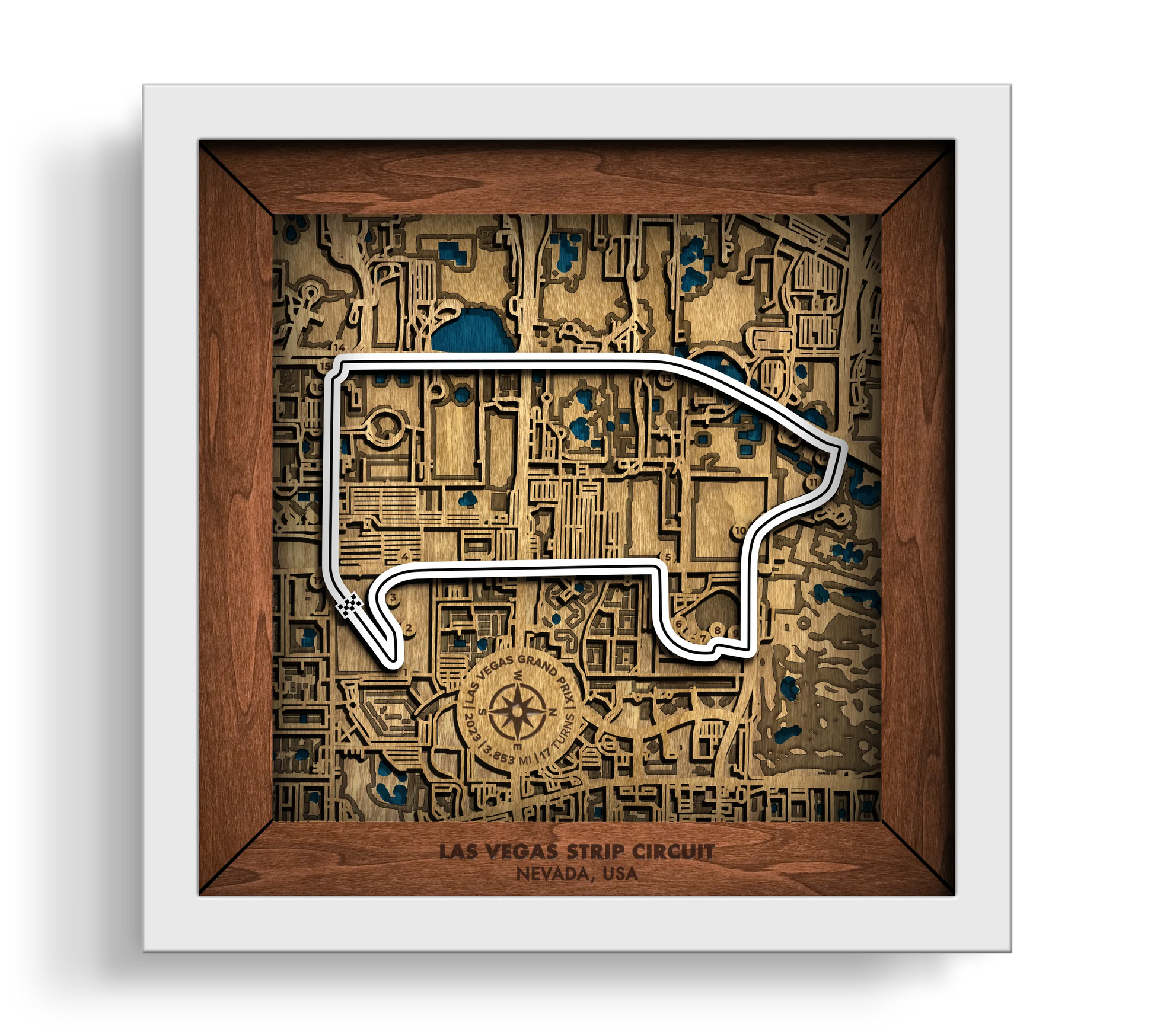 Handcrafted Las Vegas Strip Circuit layered wooden racetrack wall art in a white frame.