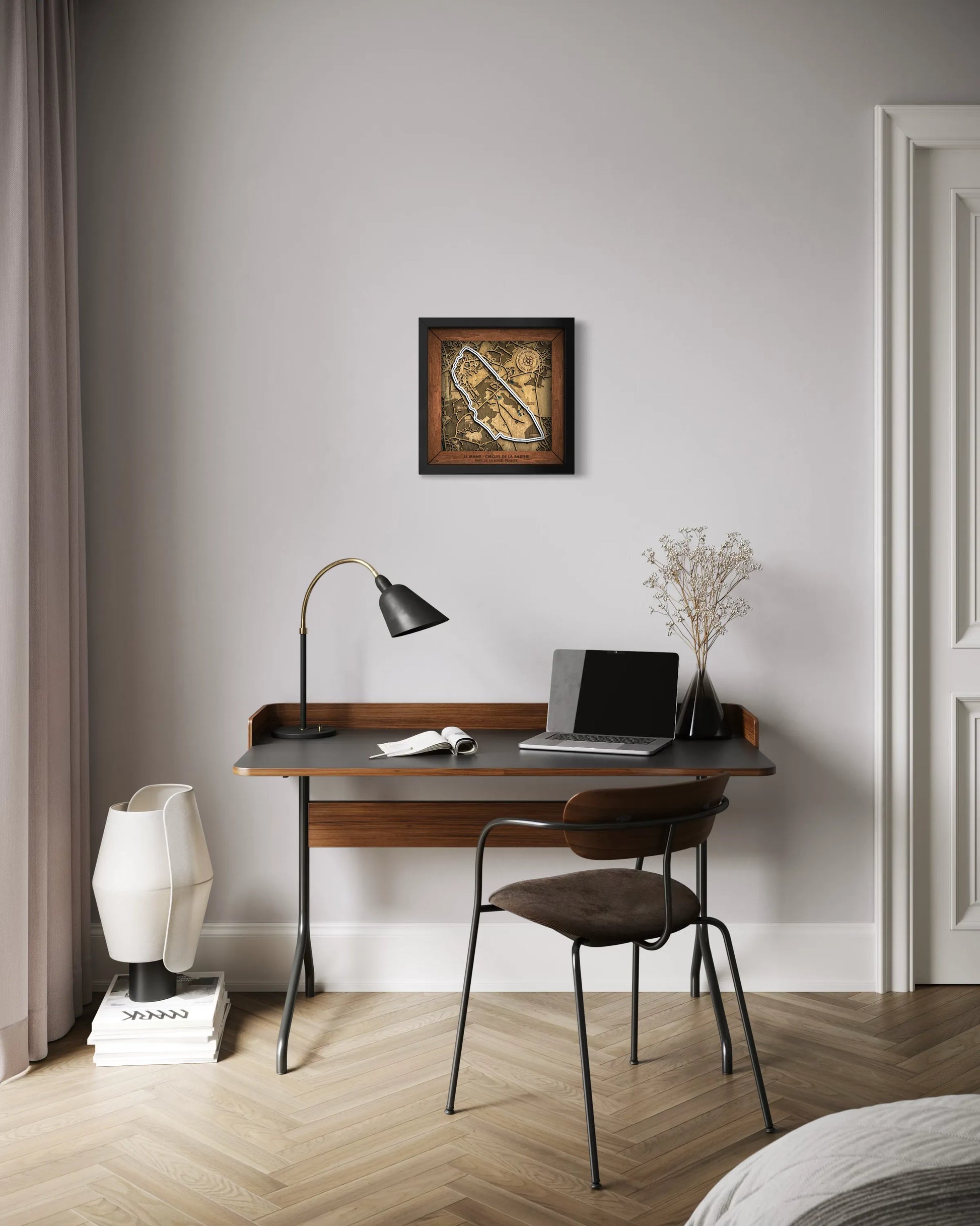 Handcrafted Le Mans Circuit layered wooden racetrack wall art displayed in a modern living room.
