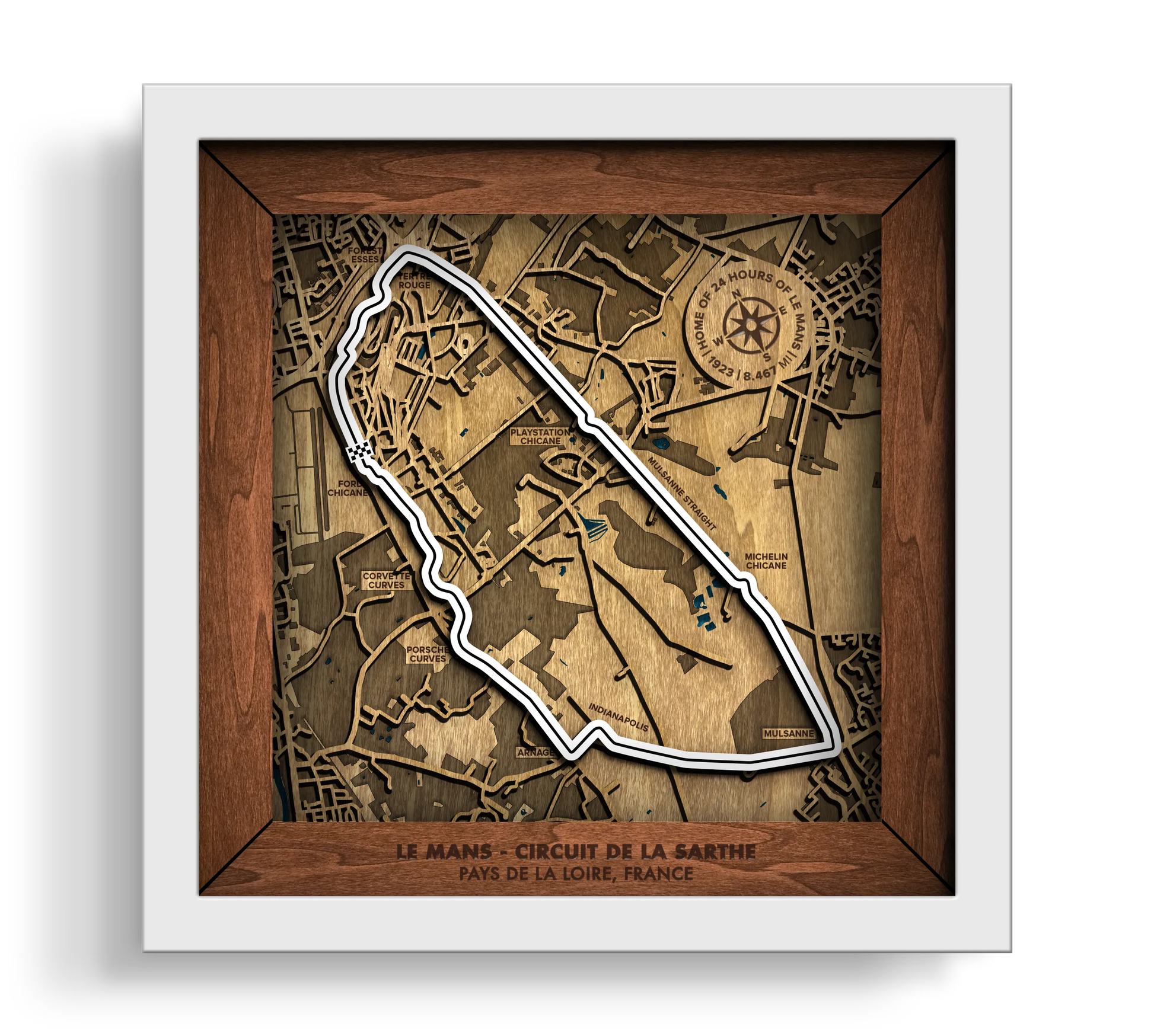 Handcrafted Le Mans Circuit layered wooden racetrack wall art in a white frame.
