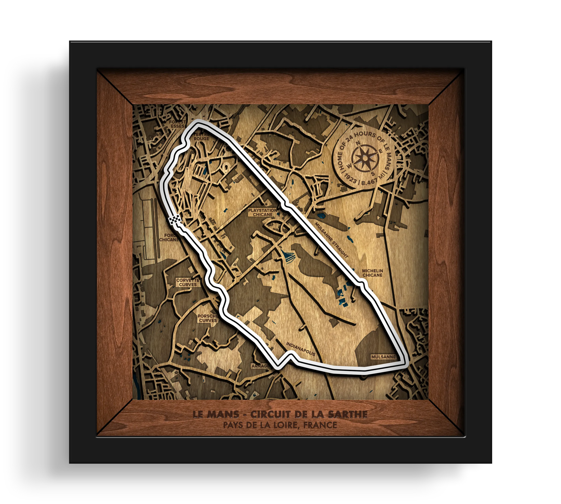 Handcrafted Le Mans Circuit layered wooden racetrack wall art in a black frame.