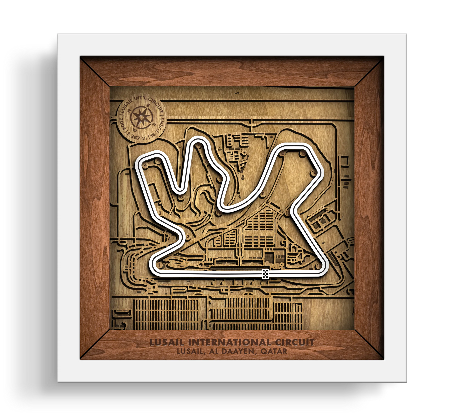 Handcrafted Lusail International Circuit layered wooden racetrack wall art in a white frame.