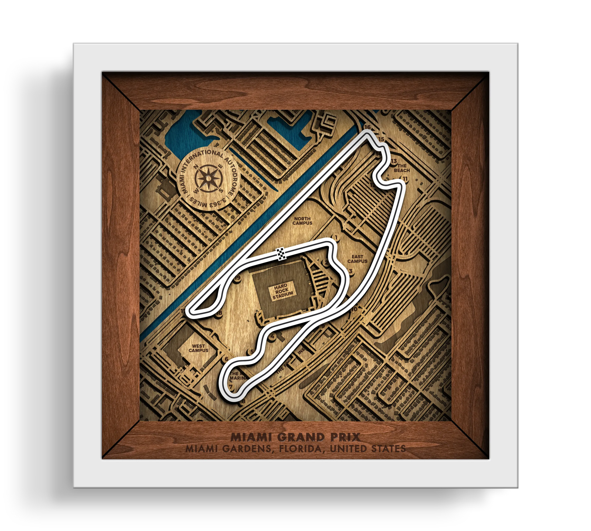 Handcrafted Miami International Autodrome layered wooden racetrack wall art in a white frame.