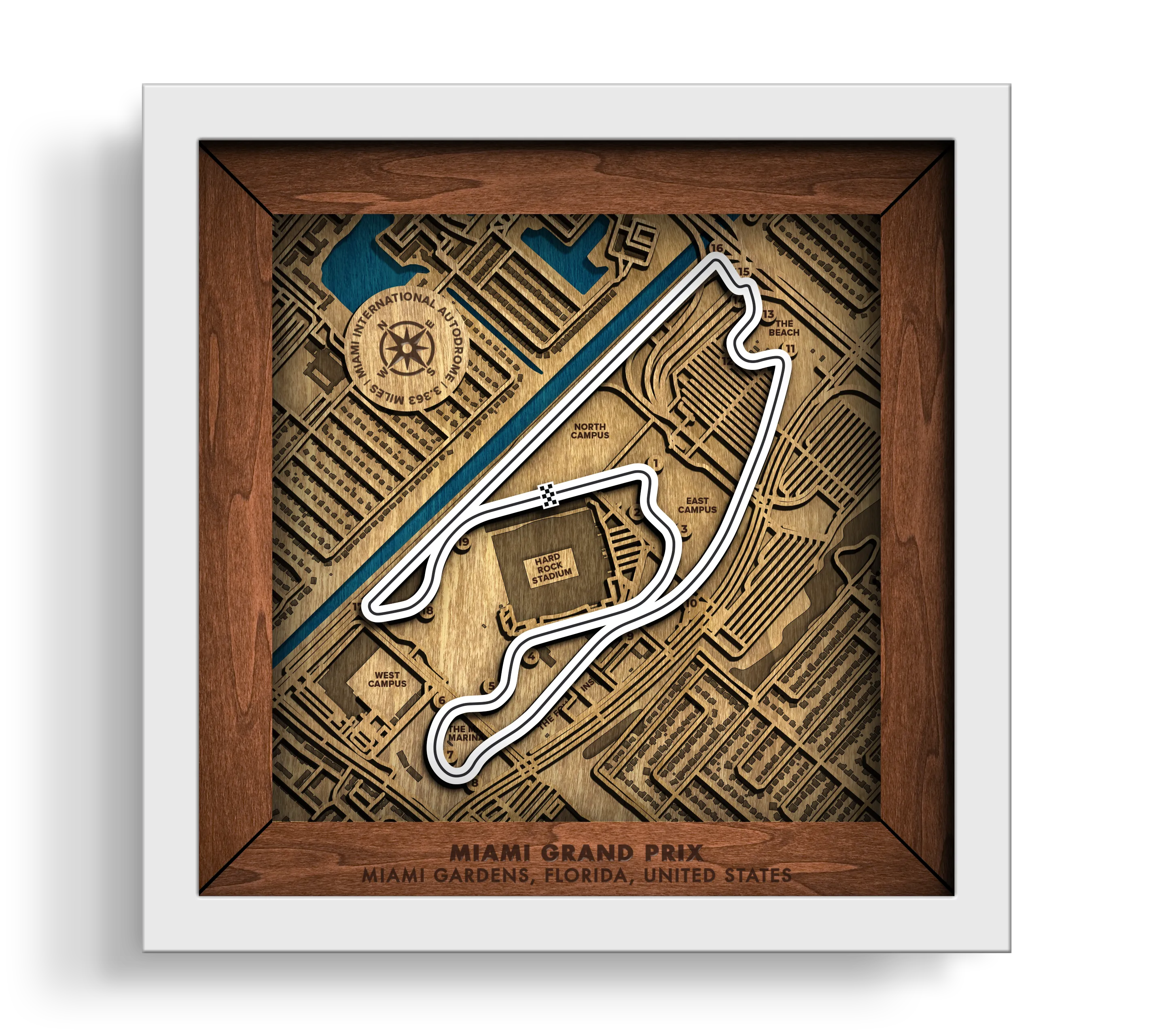 Handcrafted Miami International Autodrome layered wooden racetrack wall art in a white frame.