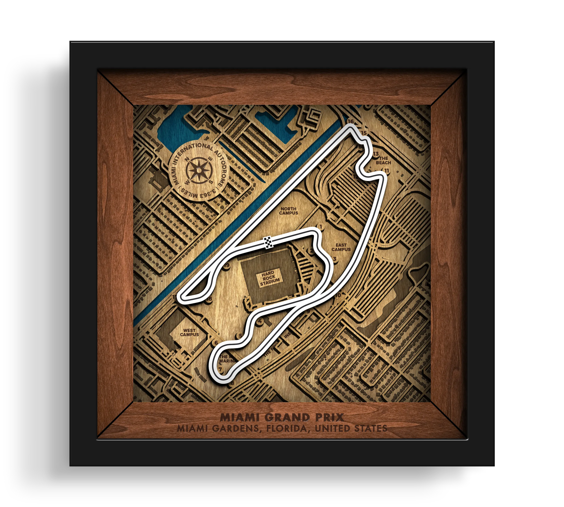 Handcrafted Miami International Autodrome layered wooden racetrack wall art in a black frame.