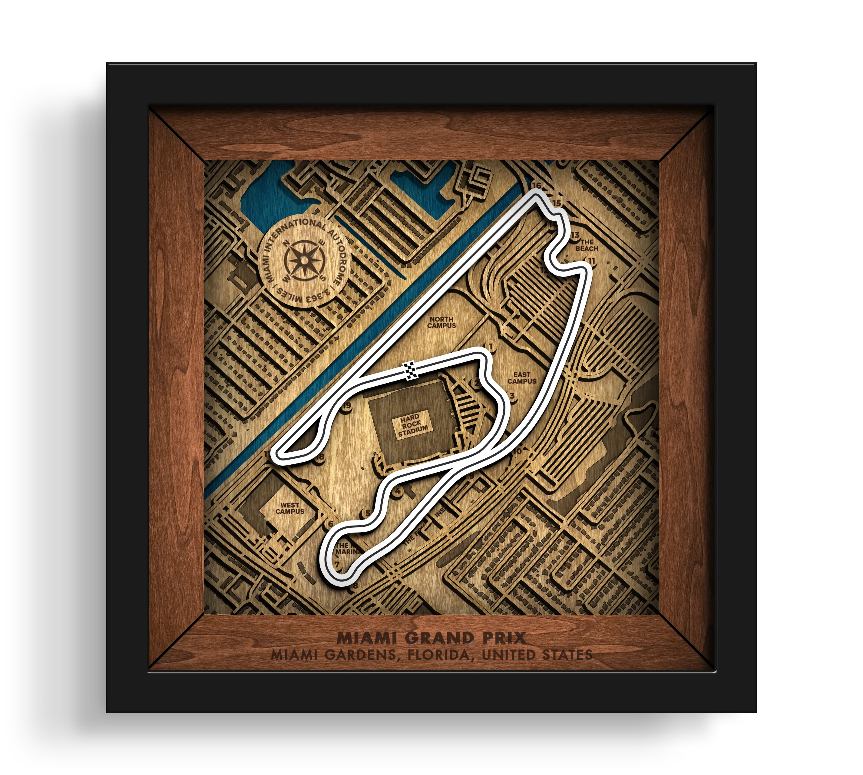 Handcrafted Miami International Autodrome layered wooden racetrack wall art in a black frame.
