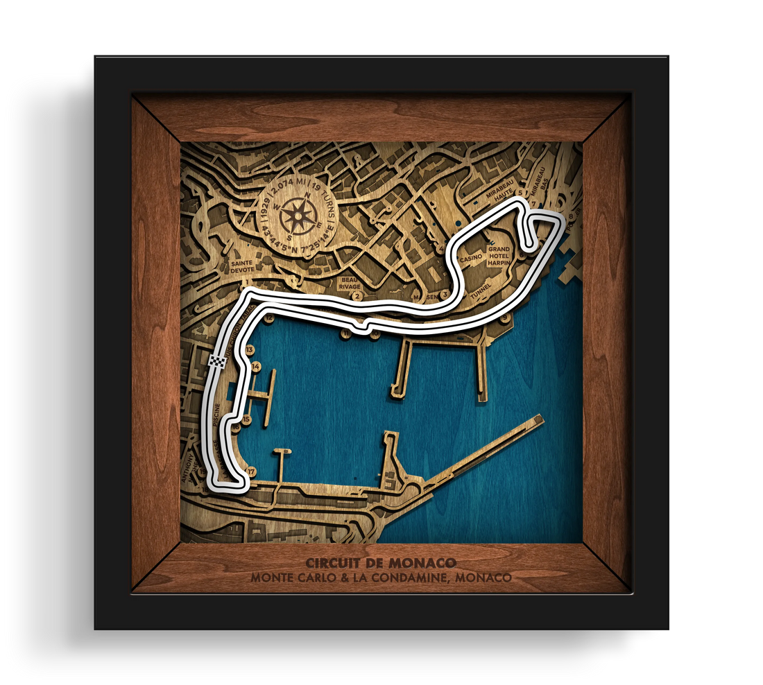 Handcrafted Circuit de Monaco layered wooden racetrack wall art in a black frame.