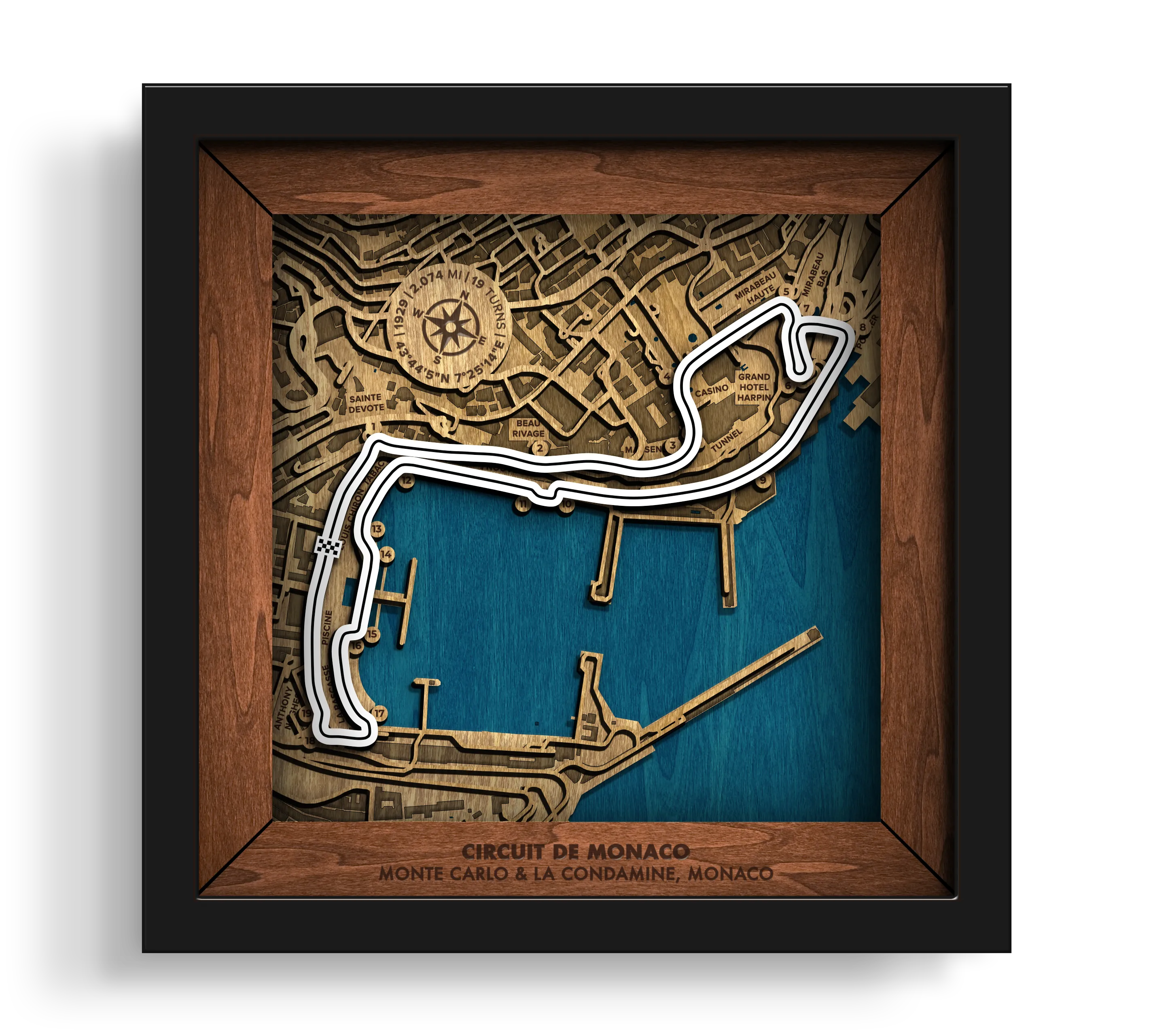 Handcrafted Circuit de Monaco layered wooden racetrack wall art in a black frame.