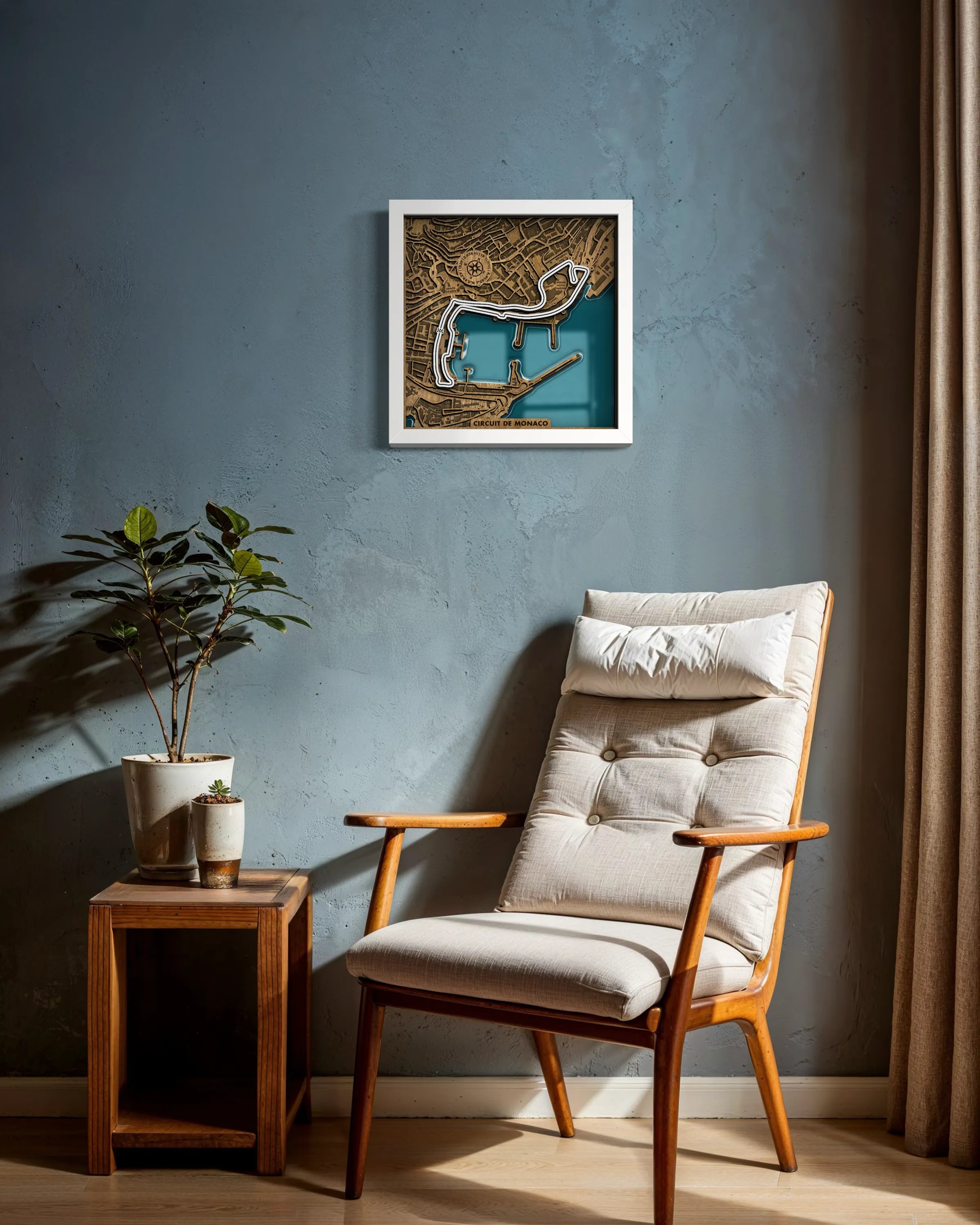 Handcrafted Circuit de Monaco layered wooden racetrack wall art with epoxy resin waters displayed in a modern living room with a white frame.