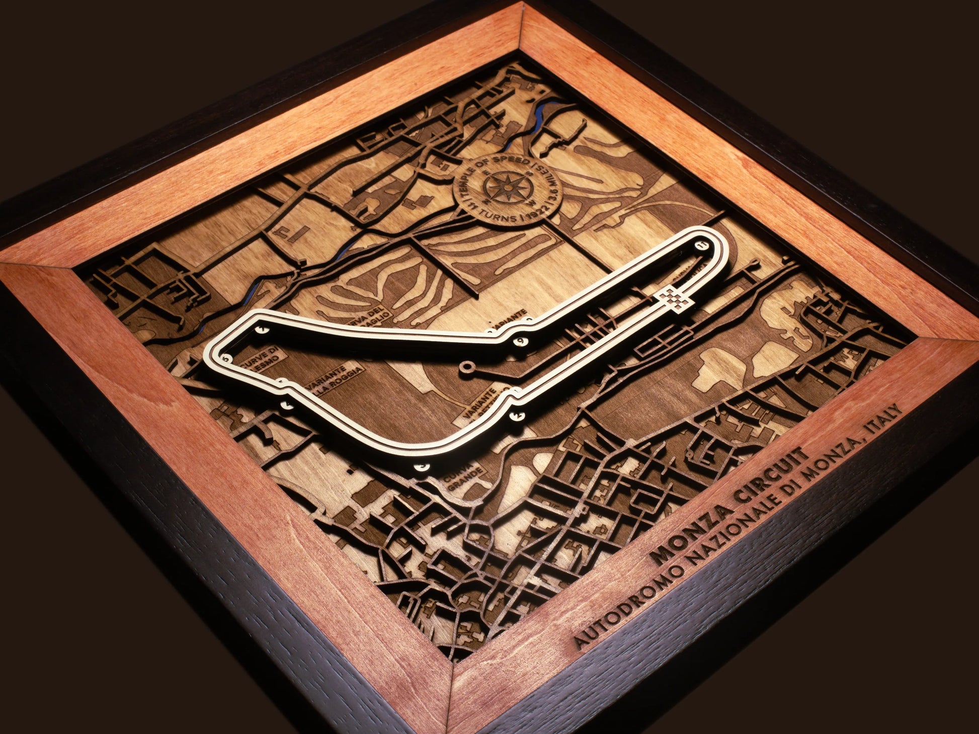 Close-up of the handcrafted layered wood construction and fine details of the Autodromo Nazionale Monza wall art.