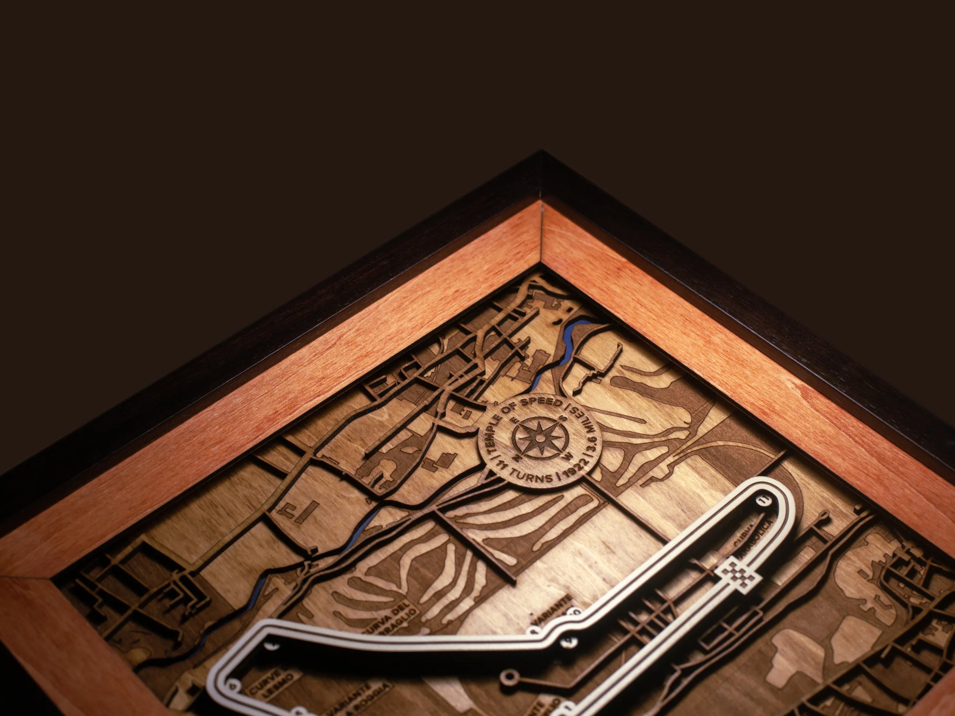 Close-up of the handcrafted layered wood construction and fine details of the Autodromo Nazionale Monza wall art.