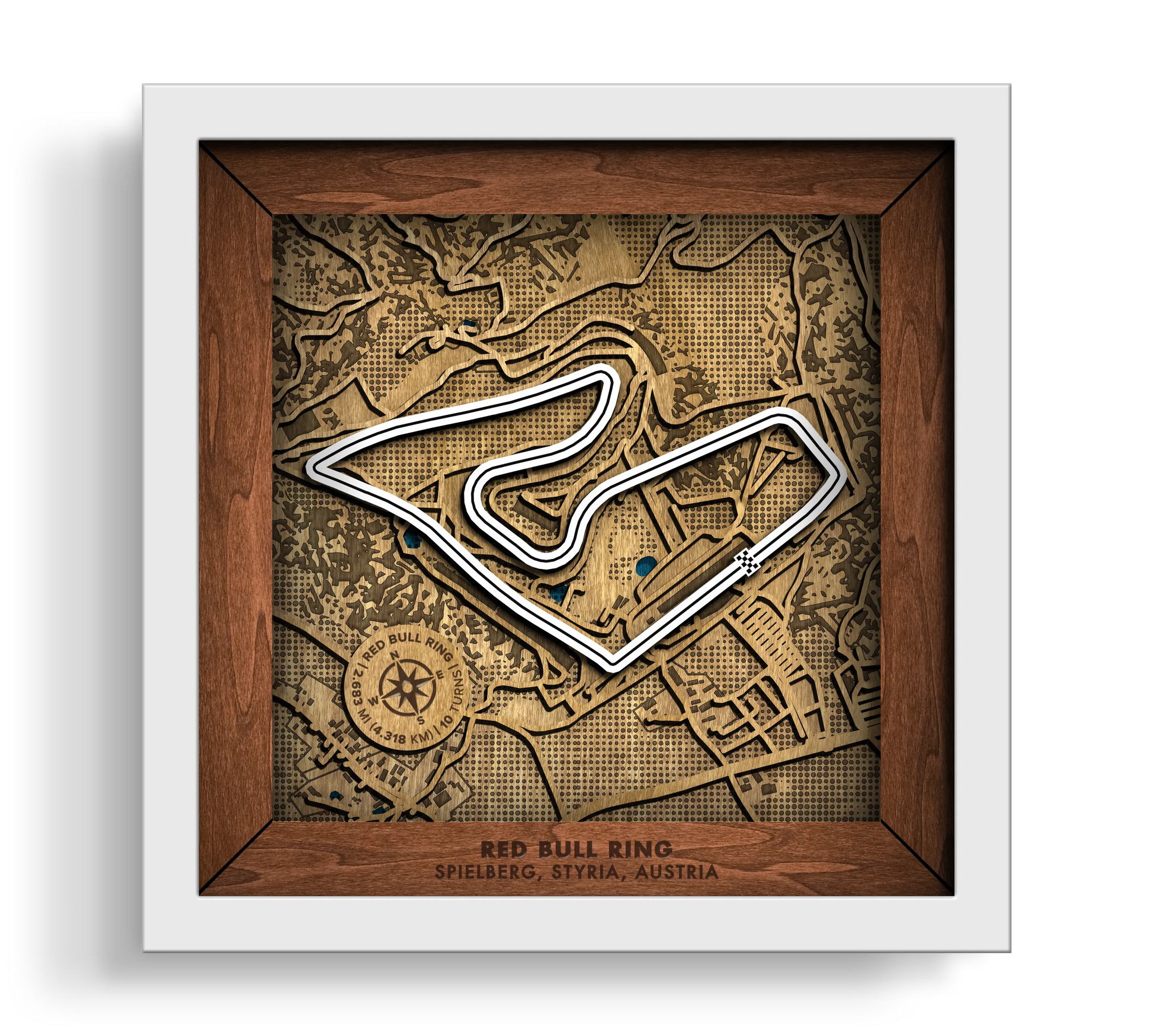 Handcrafted Red Bull Ring layered wooden racetrack wall art in a white frame.