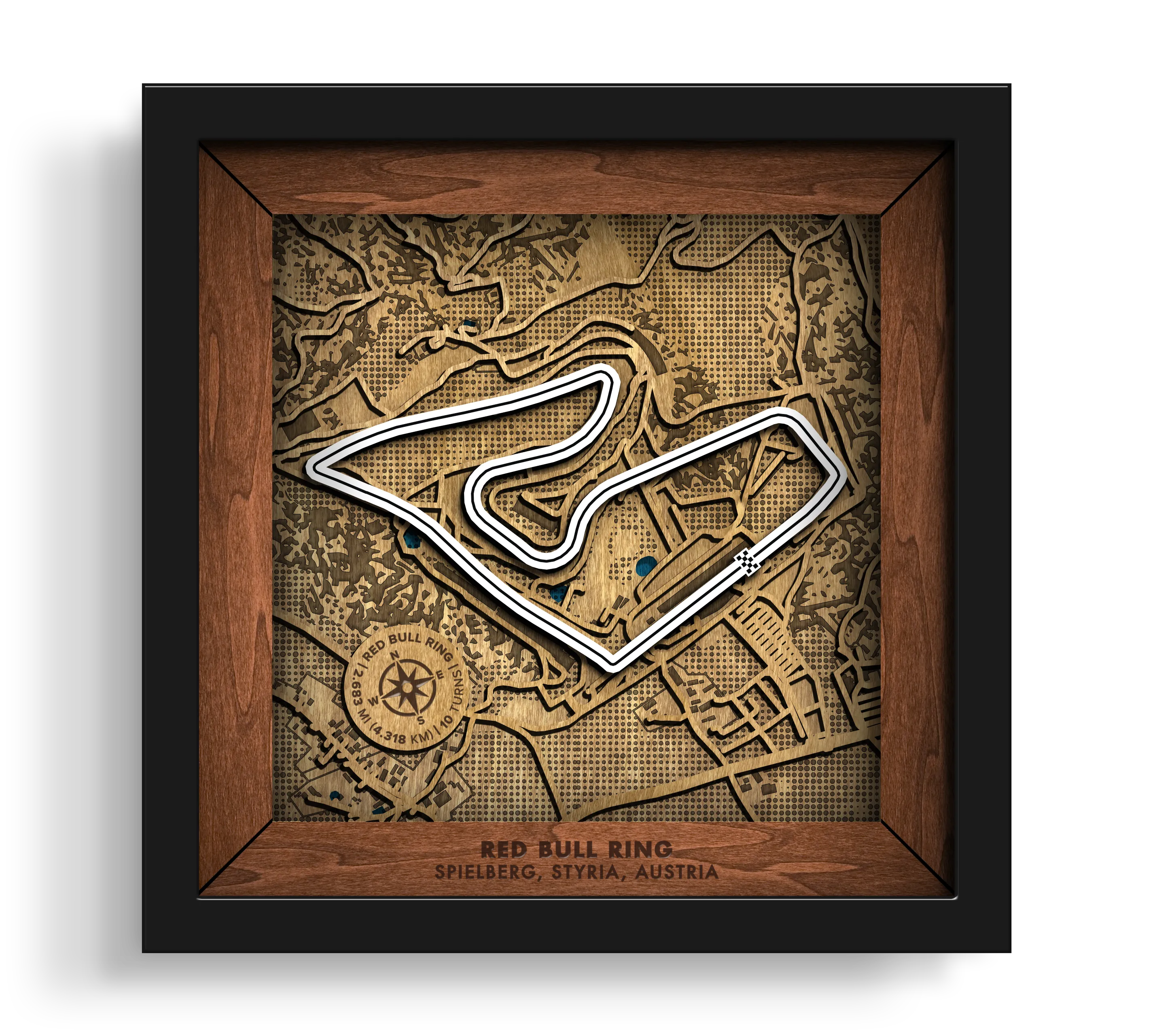 Handcrafted Red Bull Ring layered wooden racetrack wall art in a black frame.