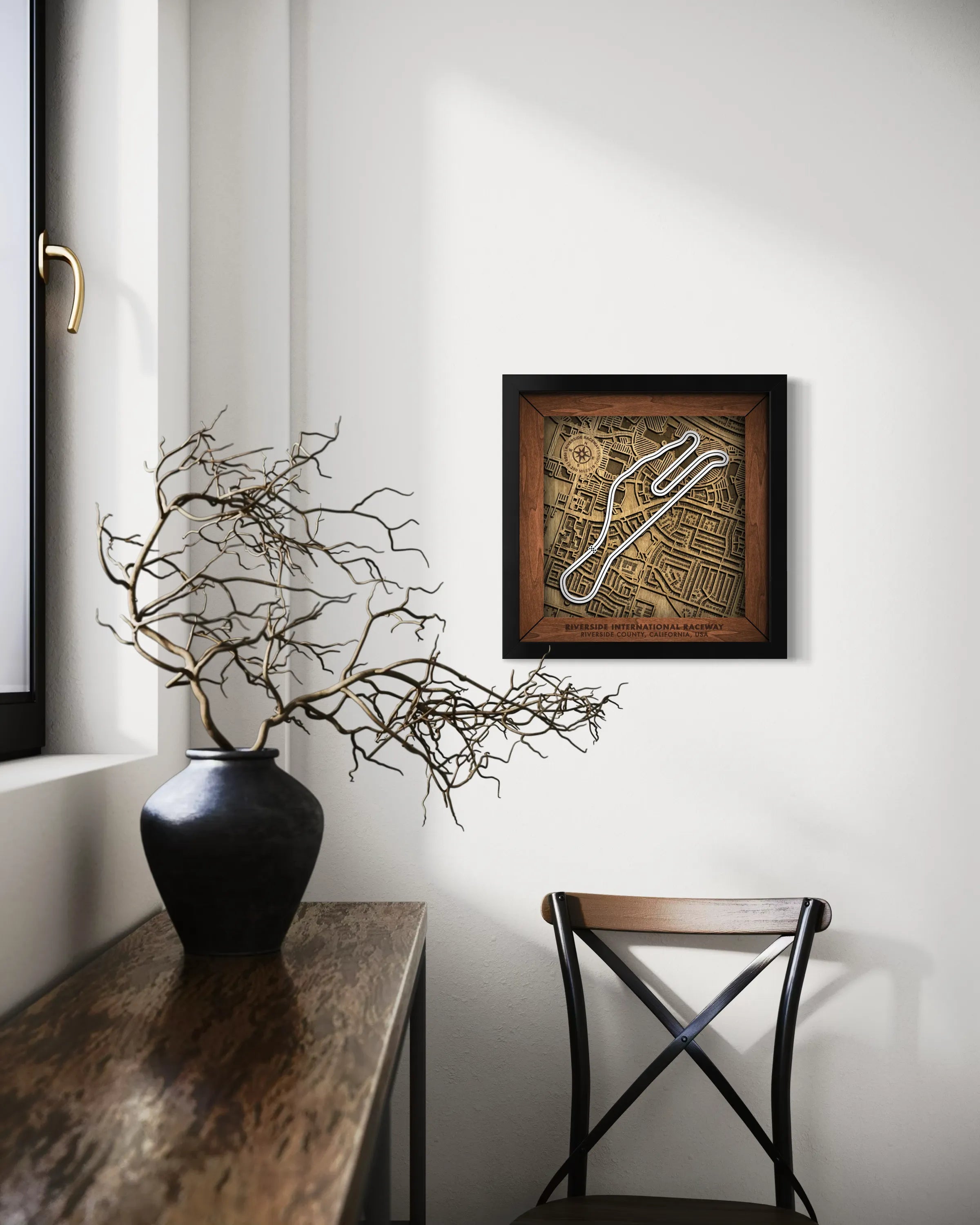 Handcrafted Riverside International Raceway wooden wall art displayed in a modern living room.