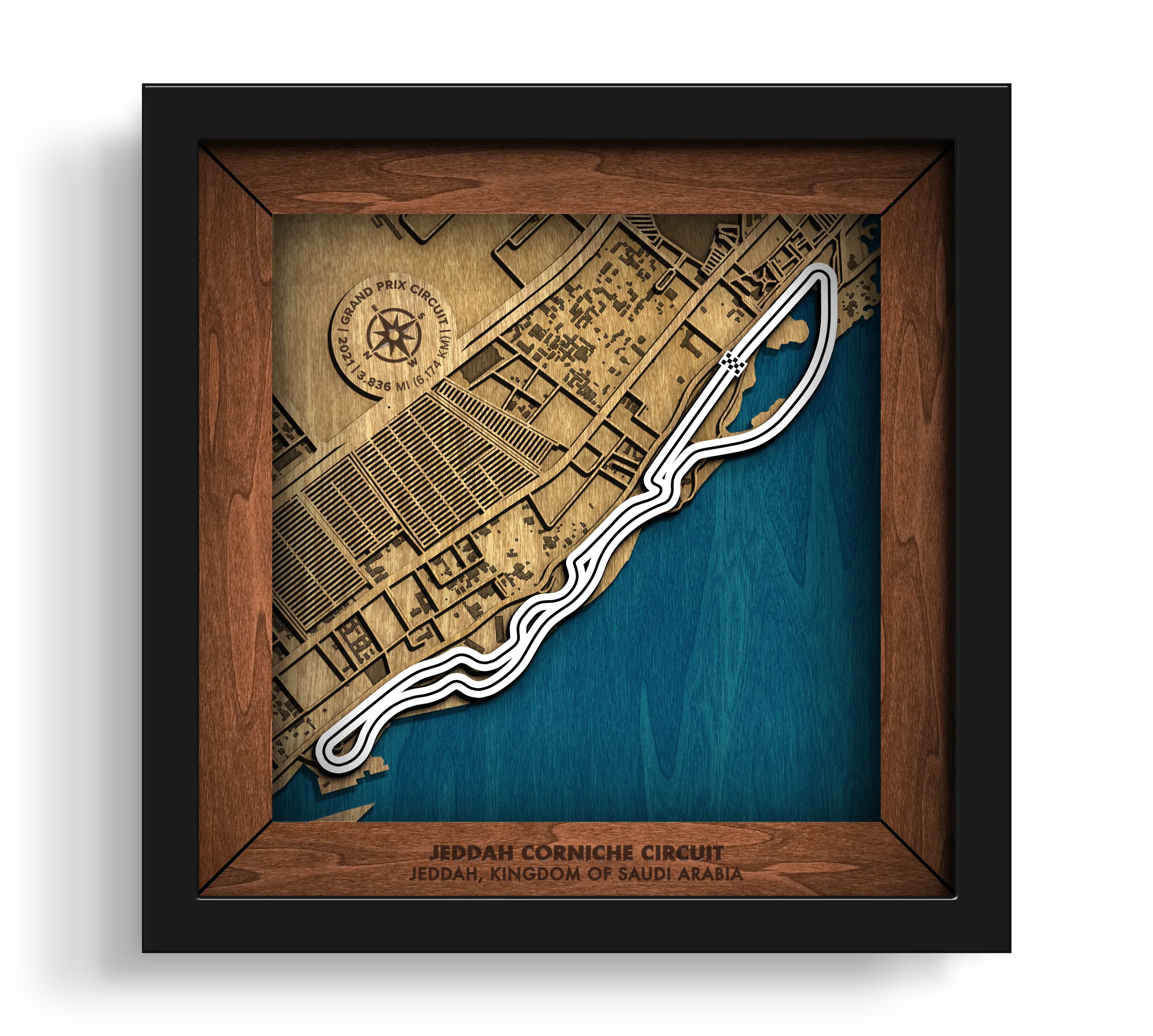 Handcrafted Jeddah Corniche Circuit layered wooden racetrack wall art in a black frame.
