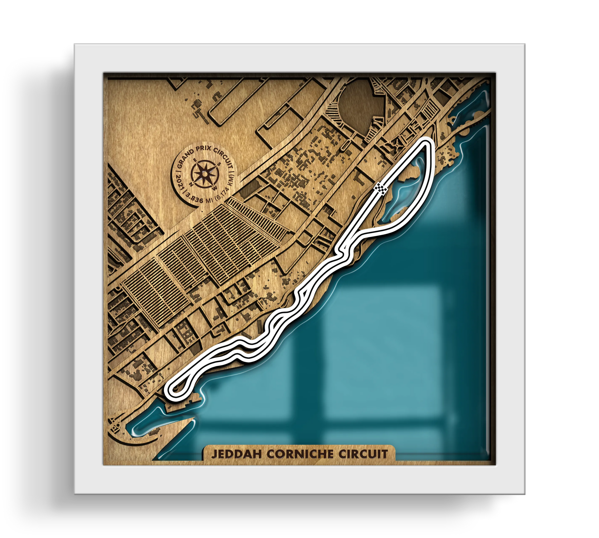Handcrafted Jeddah Corniche Circuit layered wooden racetrack wall art with an epoxy resin finish in a white frame.