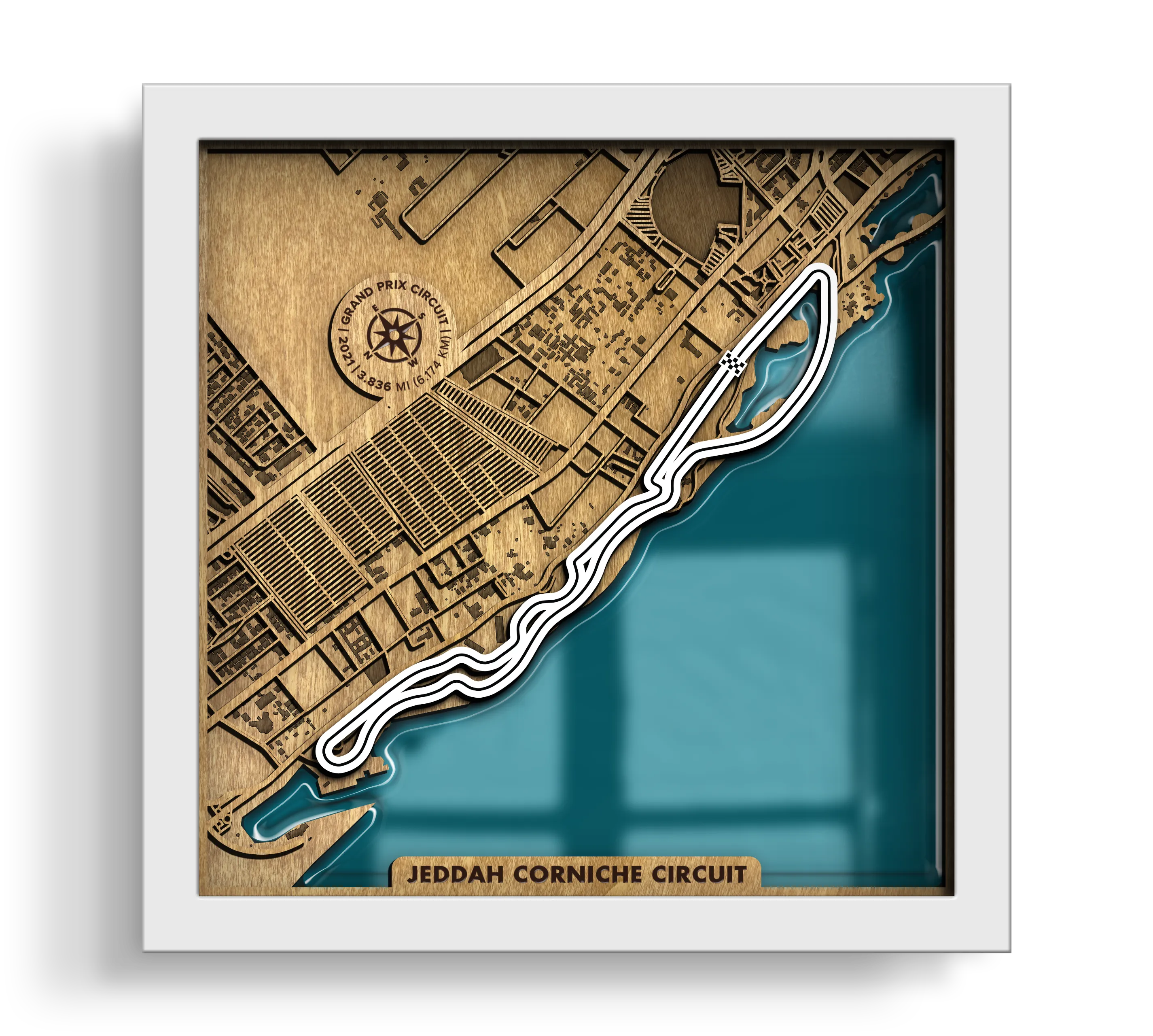 Handcrafted Jeddah Corniche Circuit layered wooden racetrack wall art with an epoxy resin finish in a white frame.
