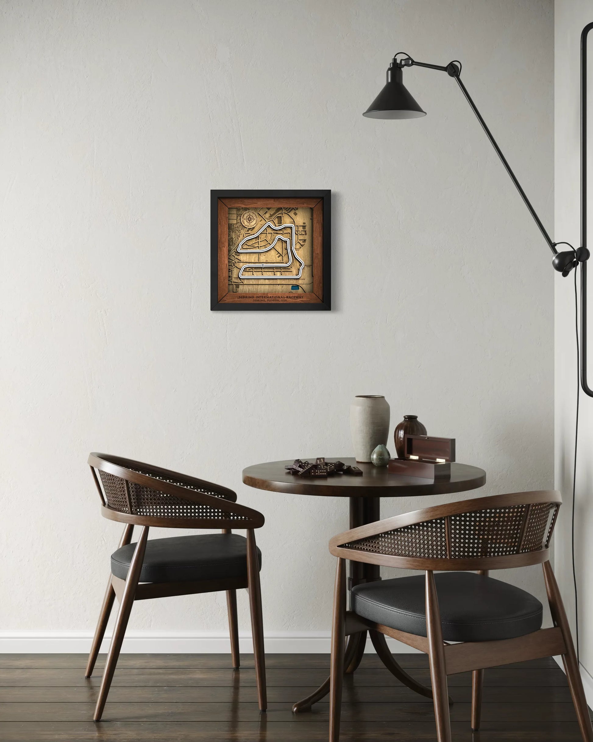 Handcrafted Sebring International Raceway layered wooden racetrack wall art displayed in a modern living room.