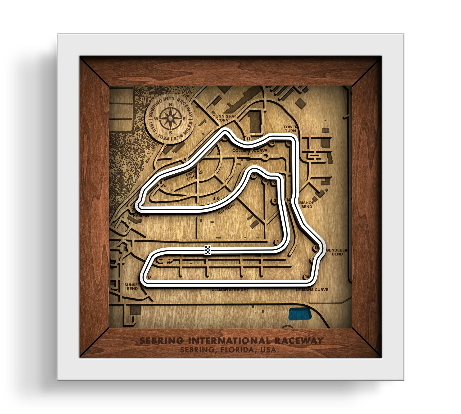 Handcrafted Sebring International Raceway layered wooden racetrack wall art in a white frame.