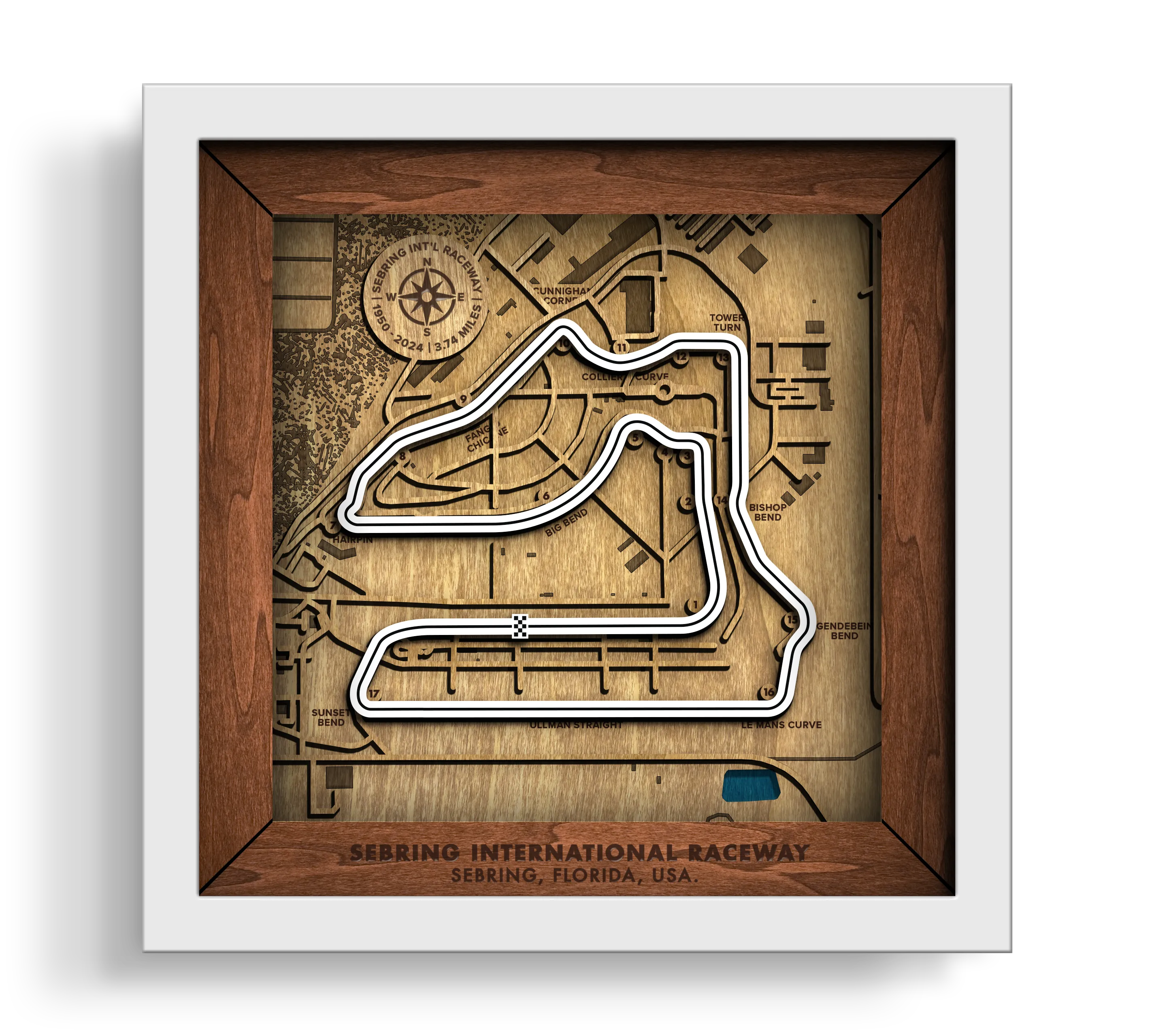 Handcrafted Sebring International Raceway layered wooden racetrack wall art in a white frame.