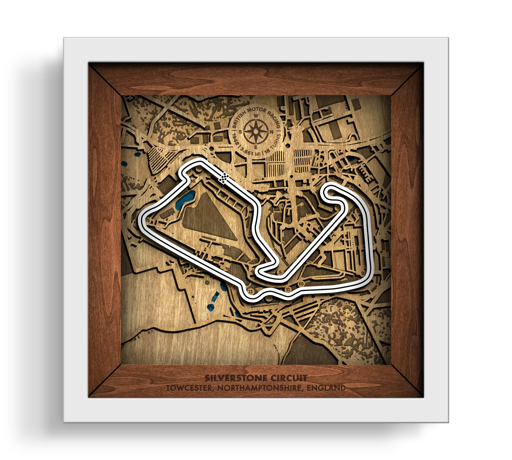 Handcrafted Silverstone Circuit layered wooden racetrack wall art in a white frame.