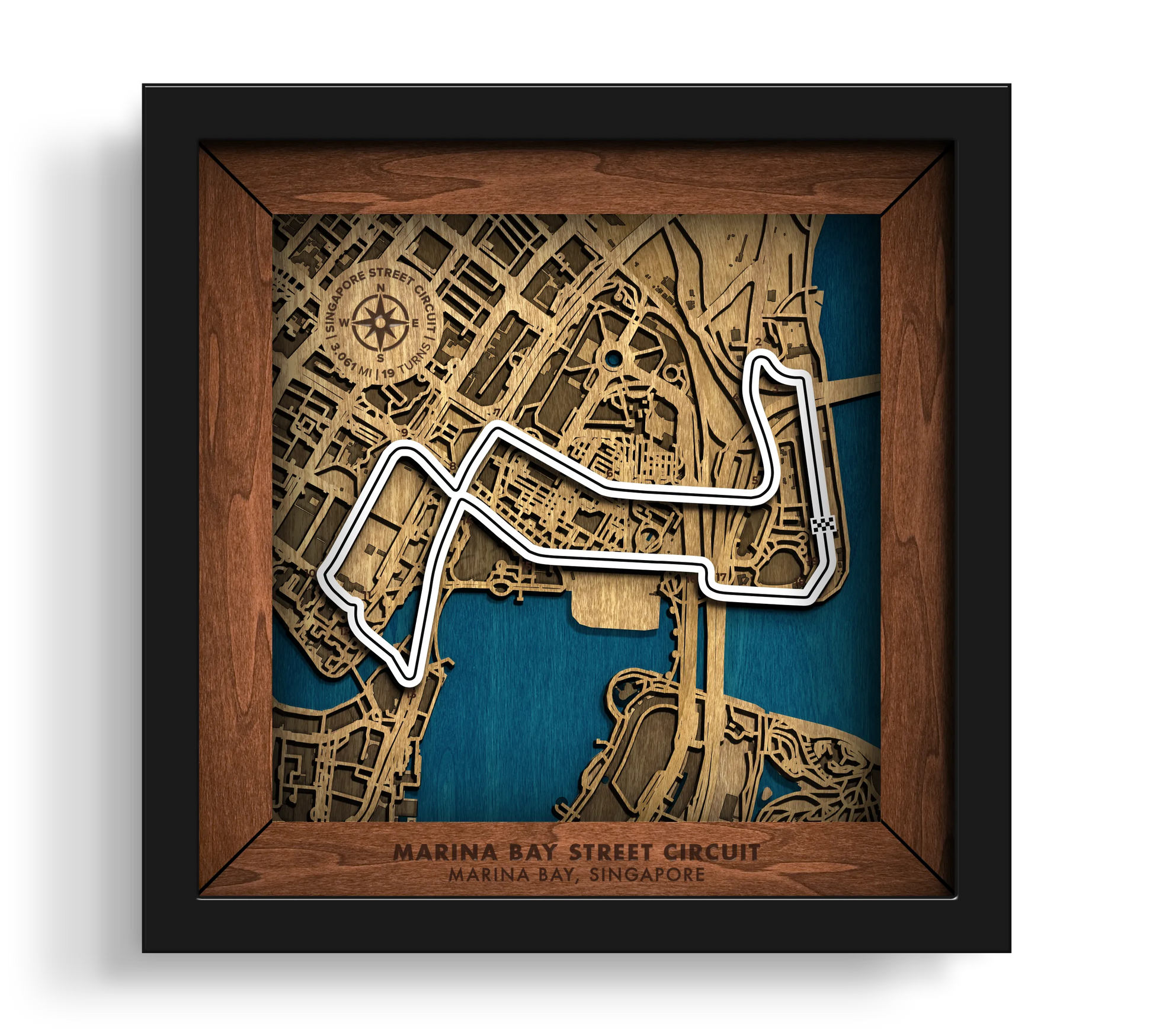 Handcrafted Marina Bay Street Circuit layered wooden racetrack wall art in a black frame.