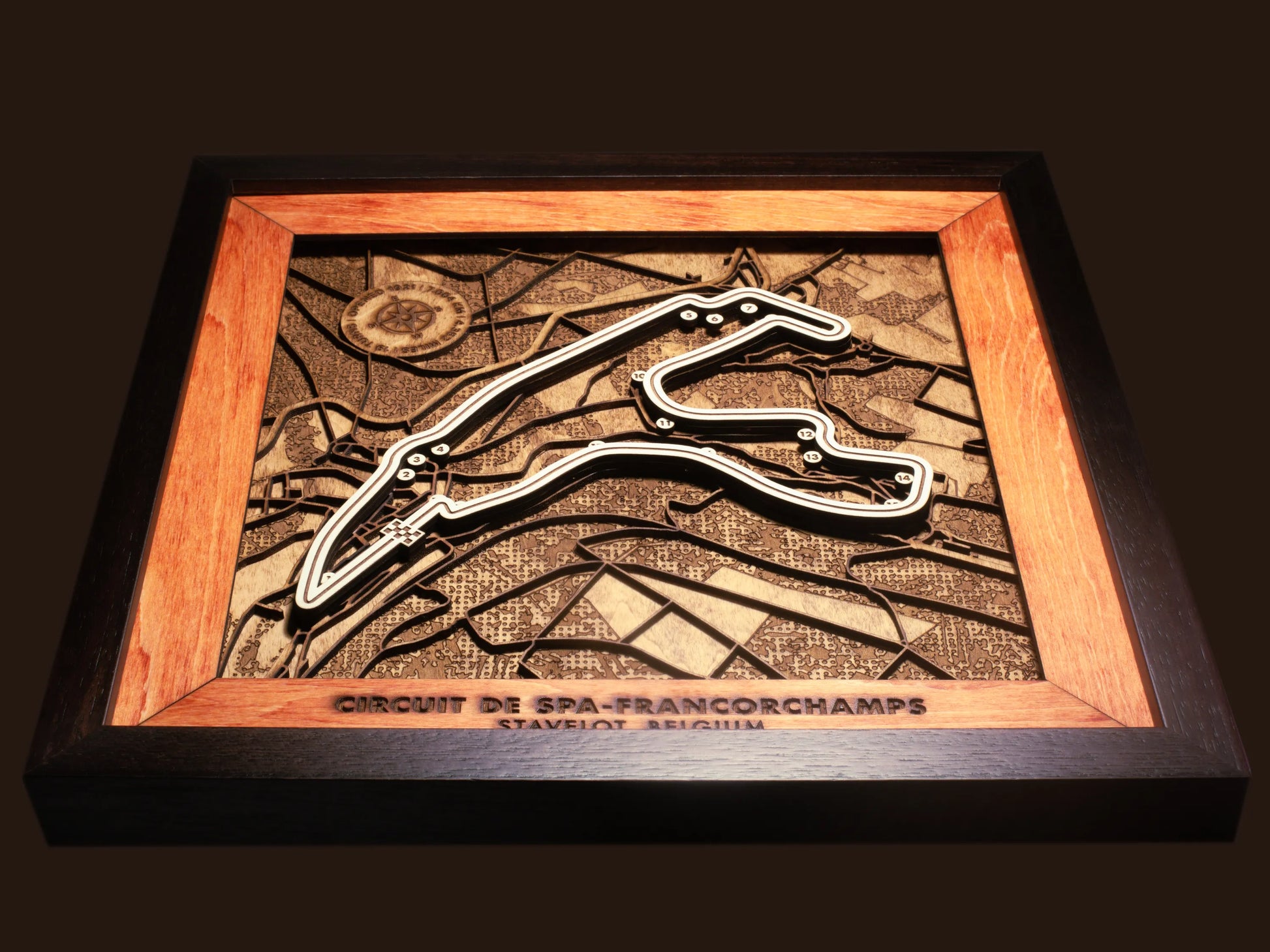 Close-up of the handcrafted layered wood construction and fine details of the Circuit de Spa-Francorchamps wall art.