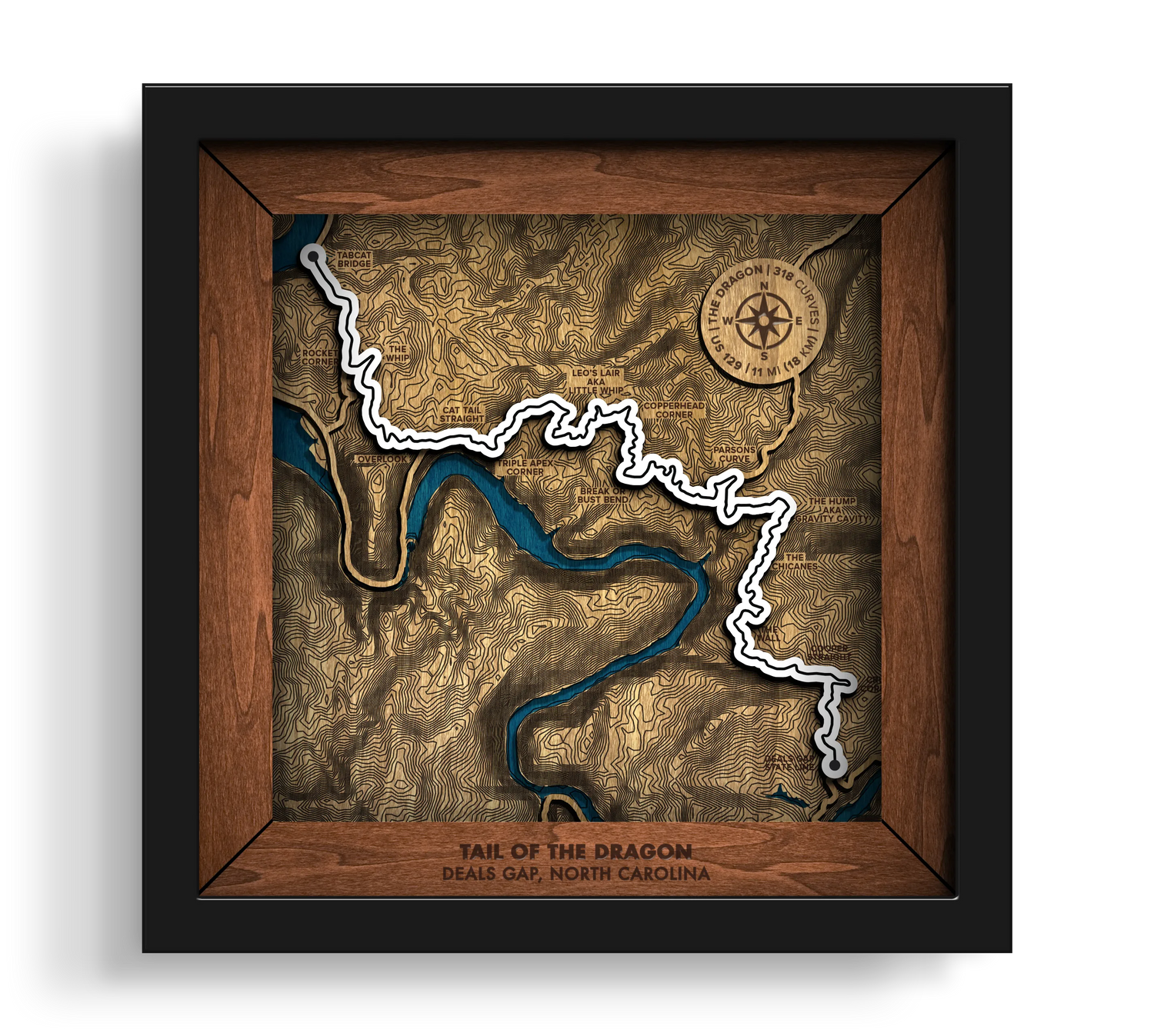 Handcrafted Tail of the Dragon layered wooden wall art in a black frame.