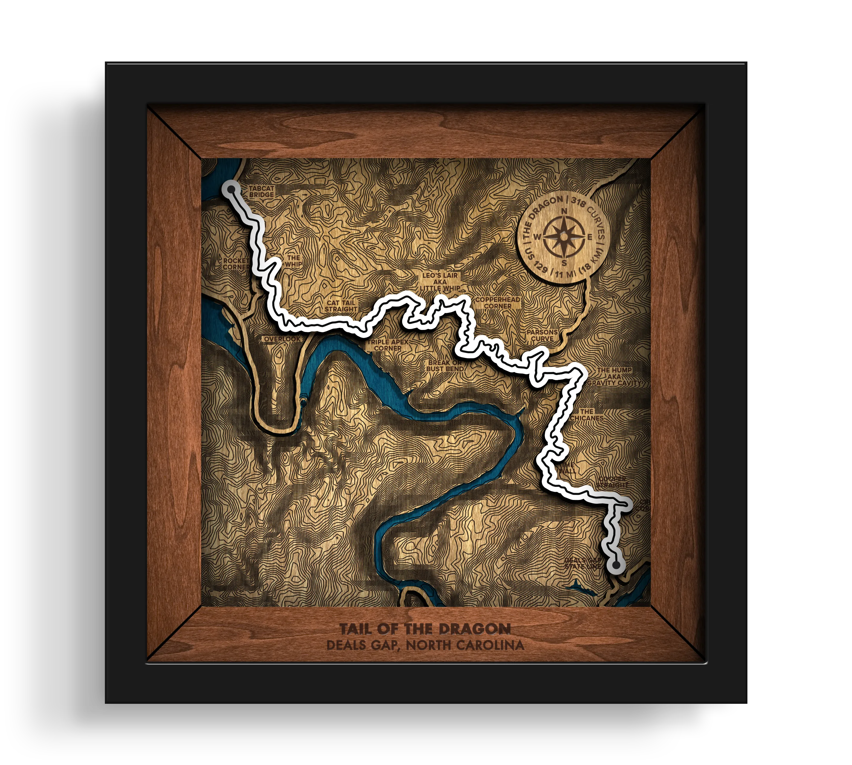 Handcrafted Tail of the Dragon layered wooden wall art in a black frame.