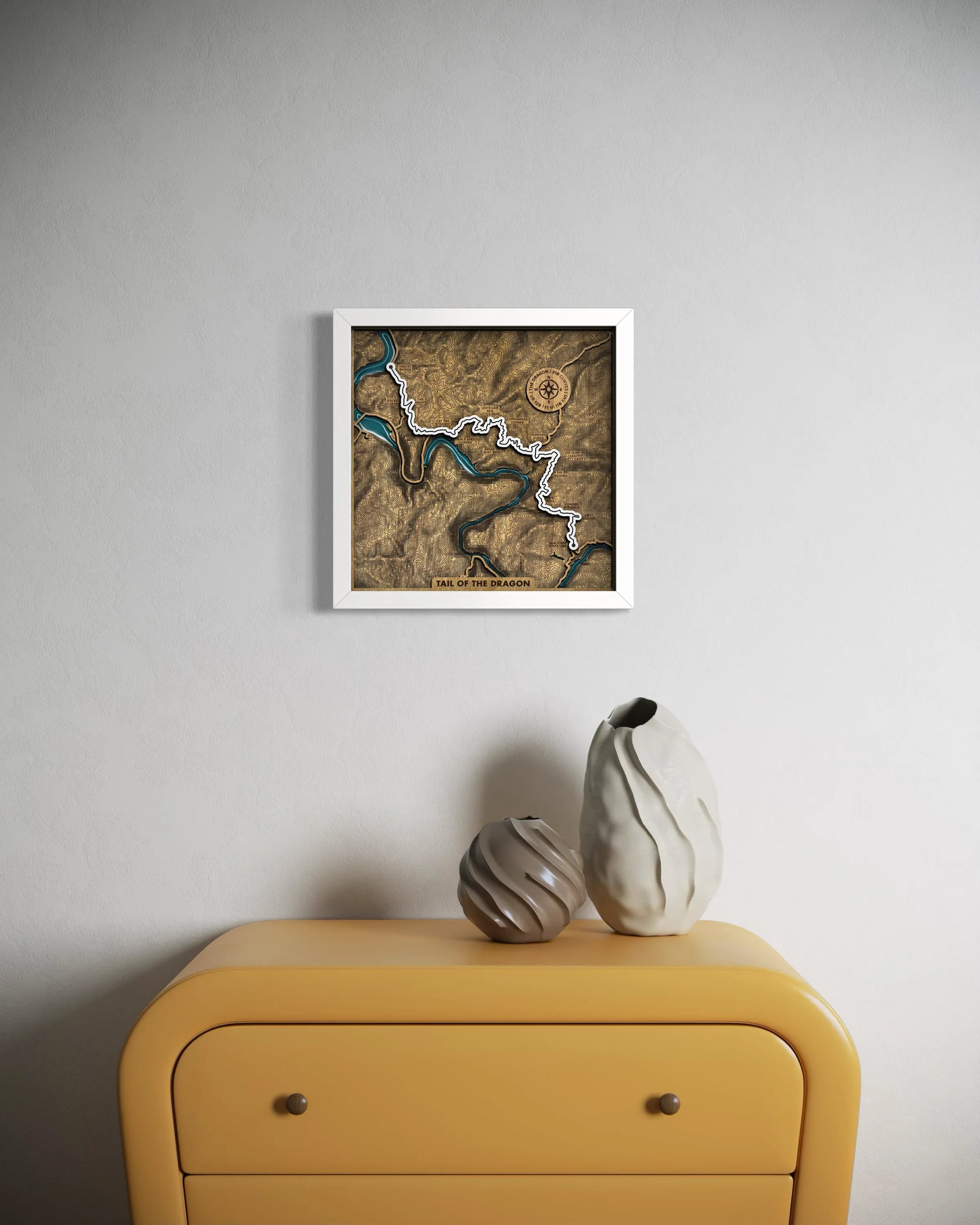 Handcrafted Tail of the Dragon layered wooden wall art with epoxy resin waters displayed in a modern living room.