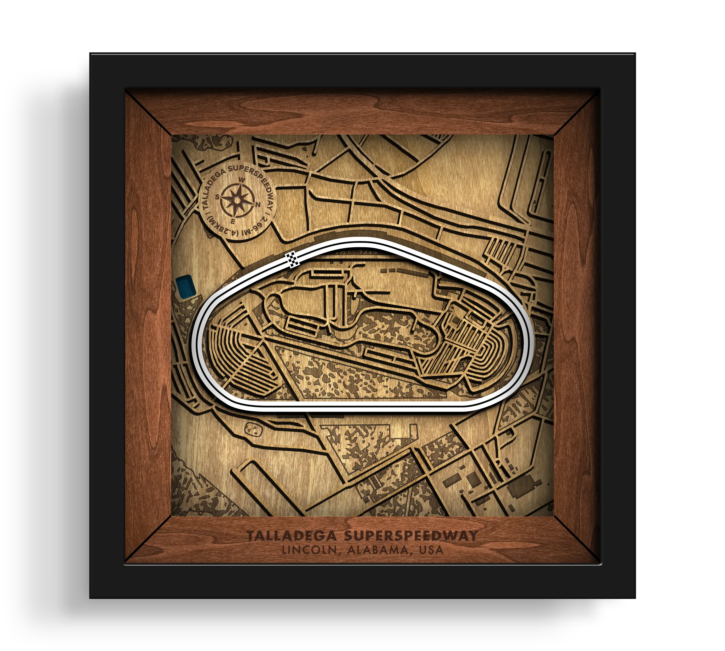 Handcrafted Talladega Superspeedway layered wooden racetrack wall art in a black frame.