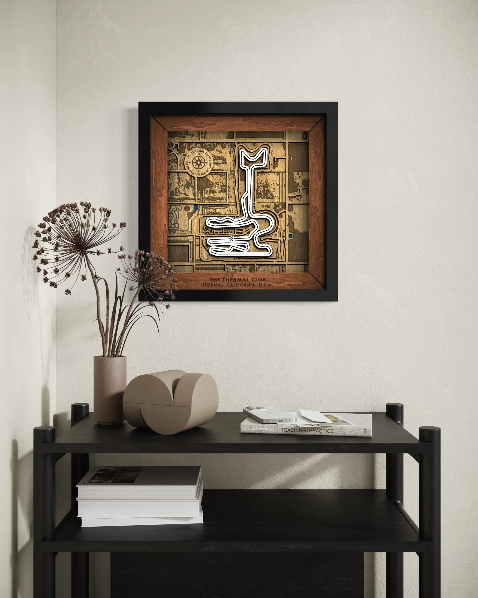 Handcrafted Thermal Club wooden wall art displayed in a modern living room.